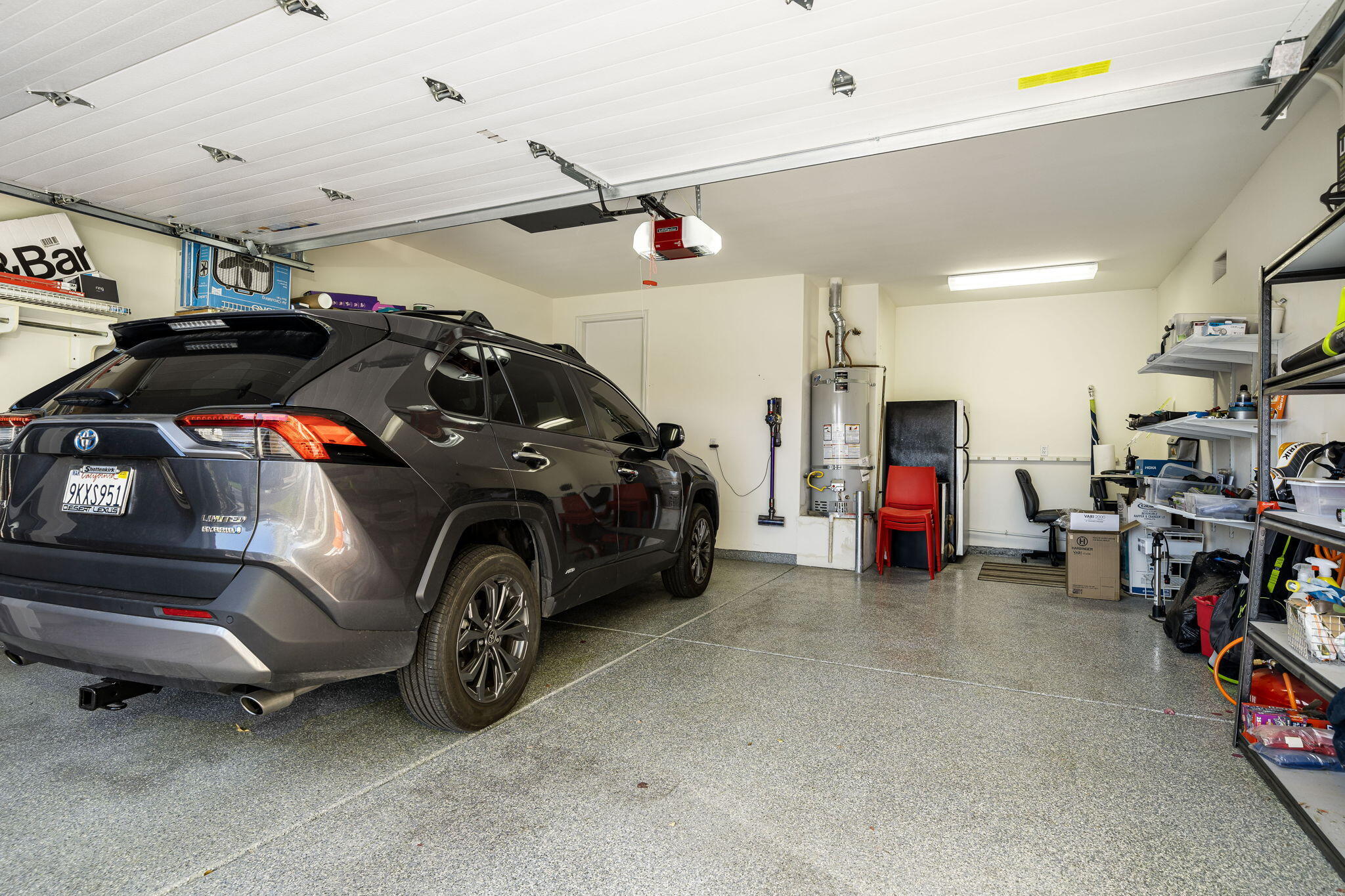 309 Loch Lomond Road Rancho Mirage, CA 92270 - Photo 26 of 27 a view of a garage with parked cars