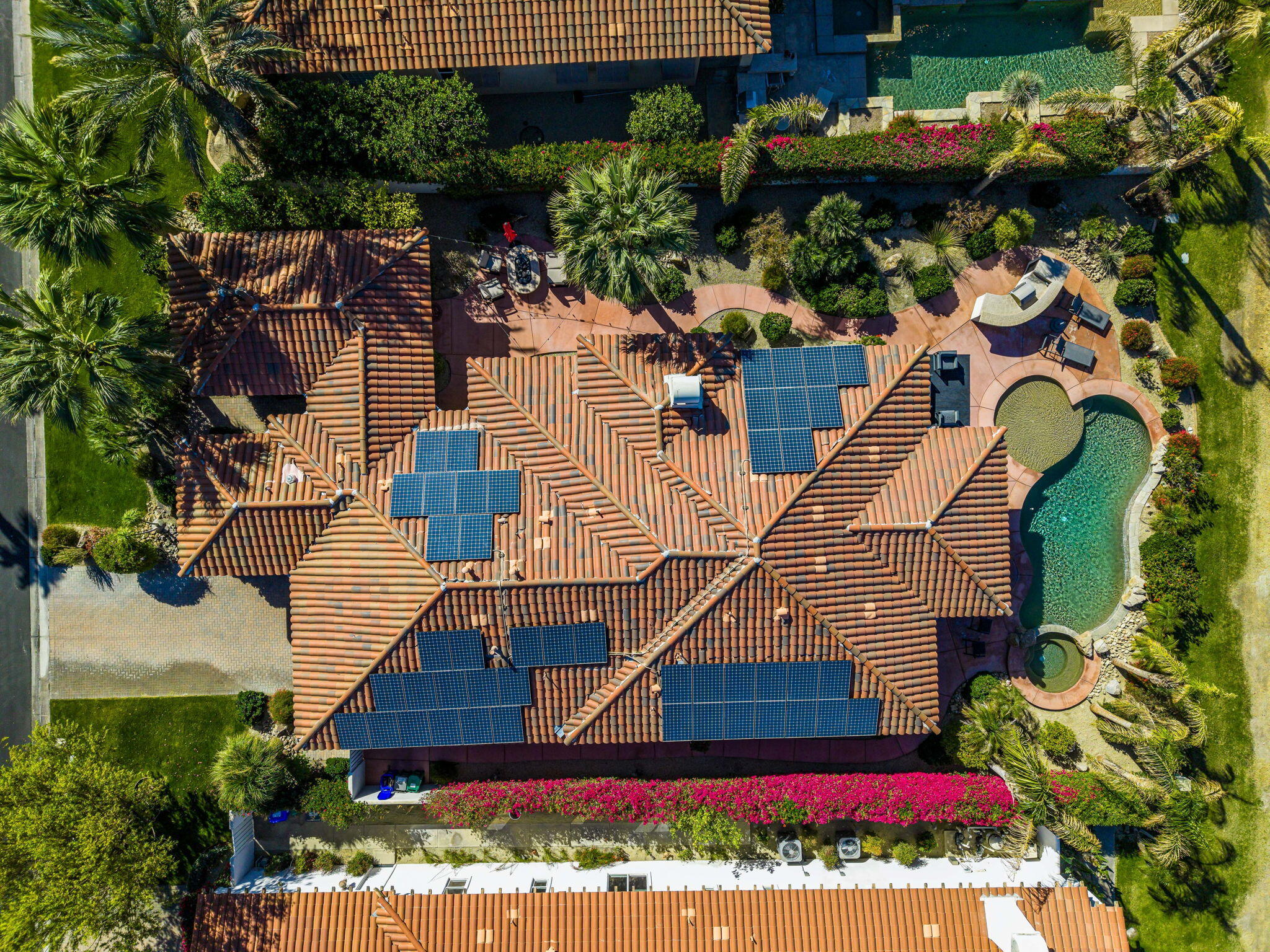 309 Loch Lomond Road Rancho Mirage, CA 92270 - Photo 27 of 27 an outdoor view of a house with a garden