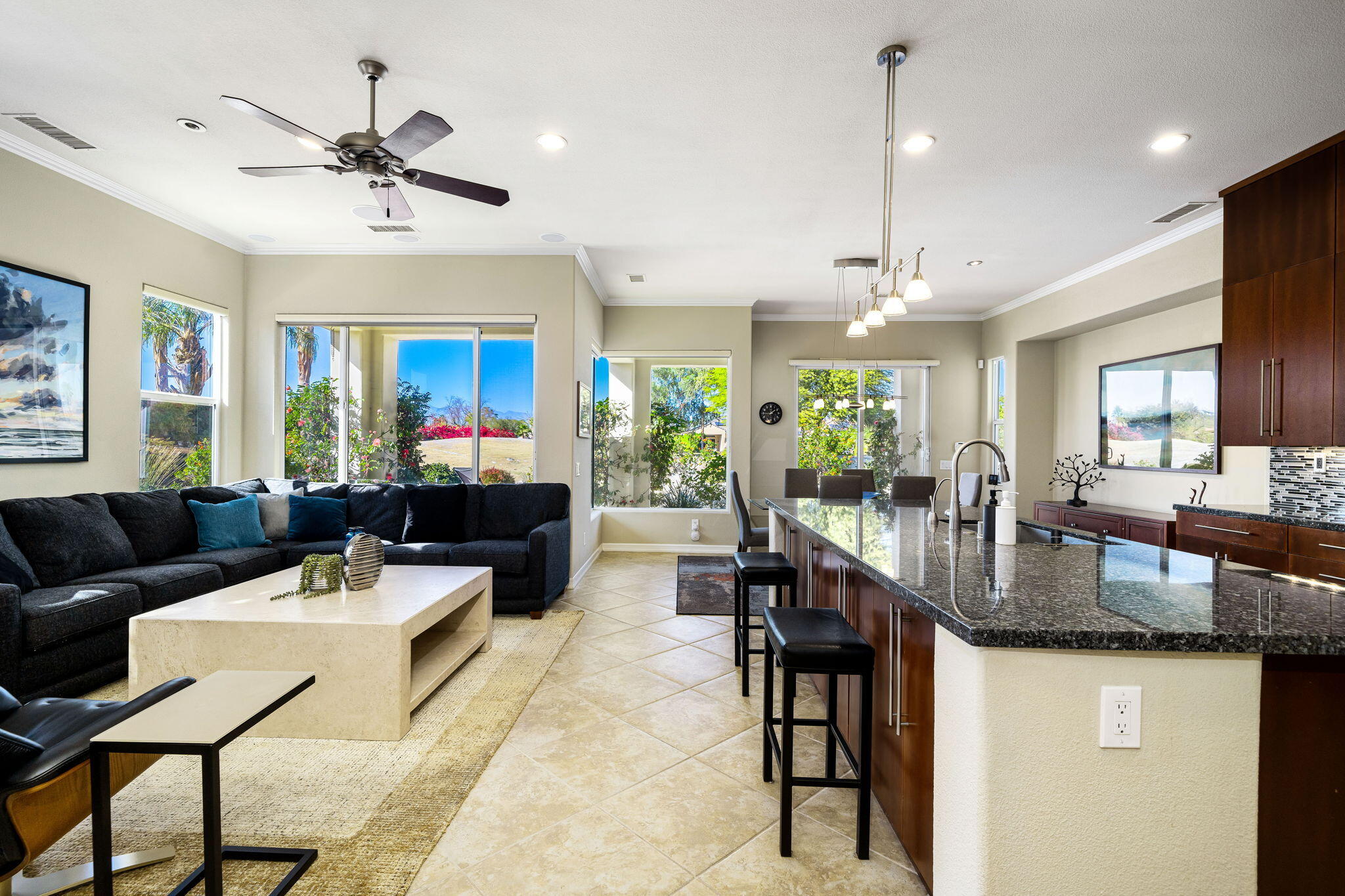 309 Loch Lomond Road Rancho Mirage, CA 92270 - Photo 6 of 27 a living room with granite countertop furniture a table and a chandelier