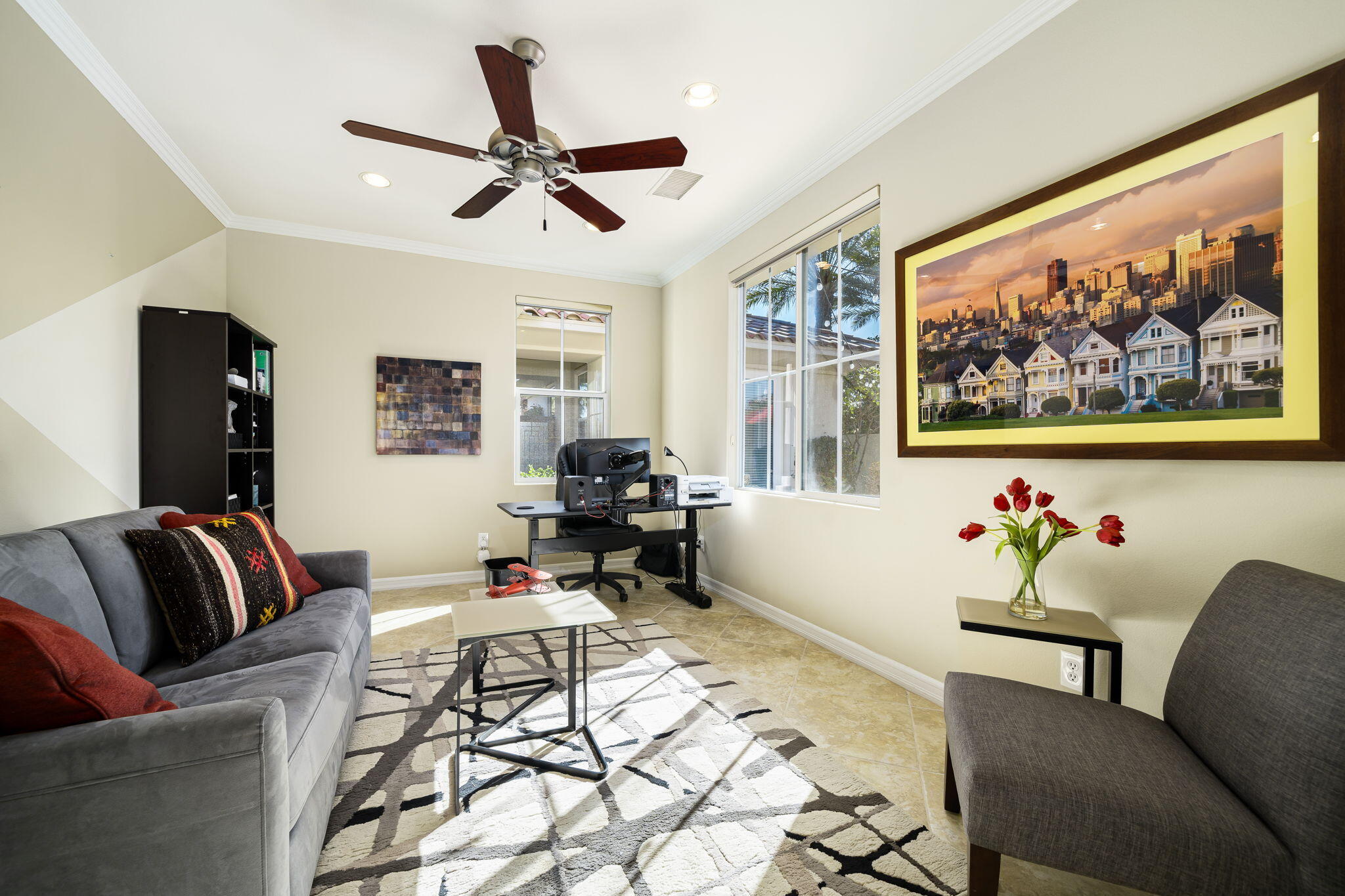 309 Loch Lomond Road Rancho Mirage, CA 92270 - Photo 9 of 27 a living room with furniture and a large window