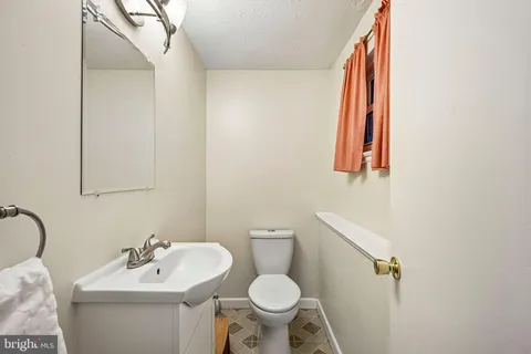 a bathroom with a sink and a toilet