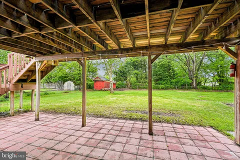 a view of a porch with a backyard