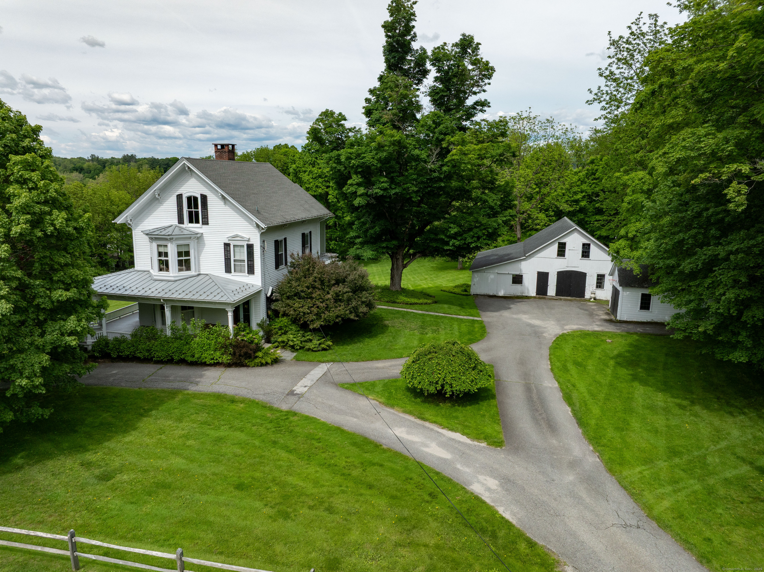 56 Sharon Road Salisbury, CT 06039 - Photo 2 of 39 a house view with a garden space