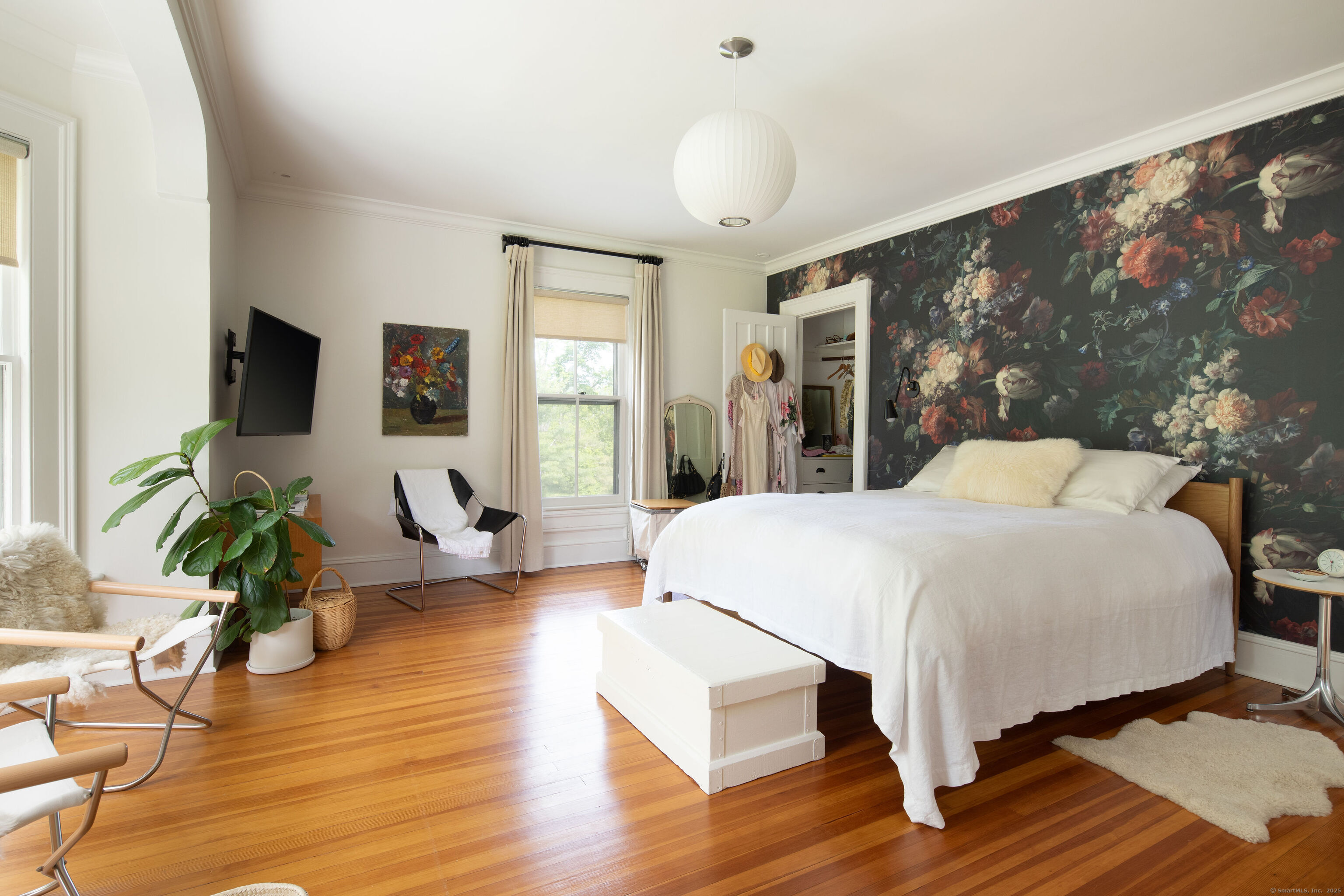 56 Sharon Road Salisbury, CT 06039 - Photo 27 of 39 a spacious bedroom with a bed and wooden floor