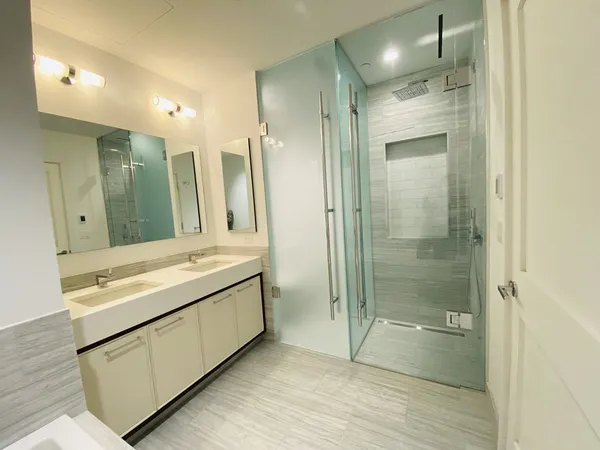 a bathroom with a bathtub and a sink