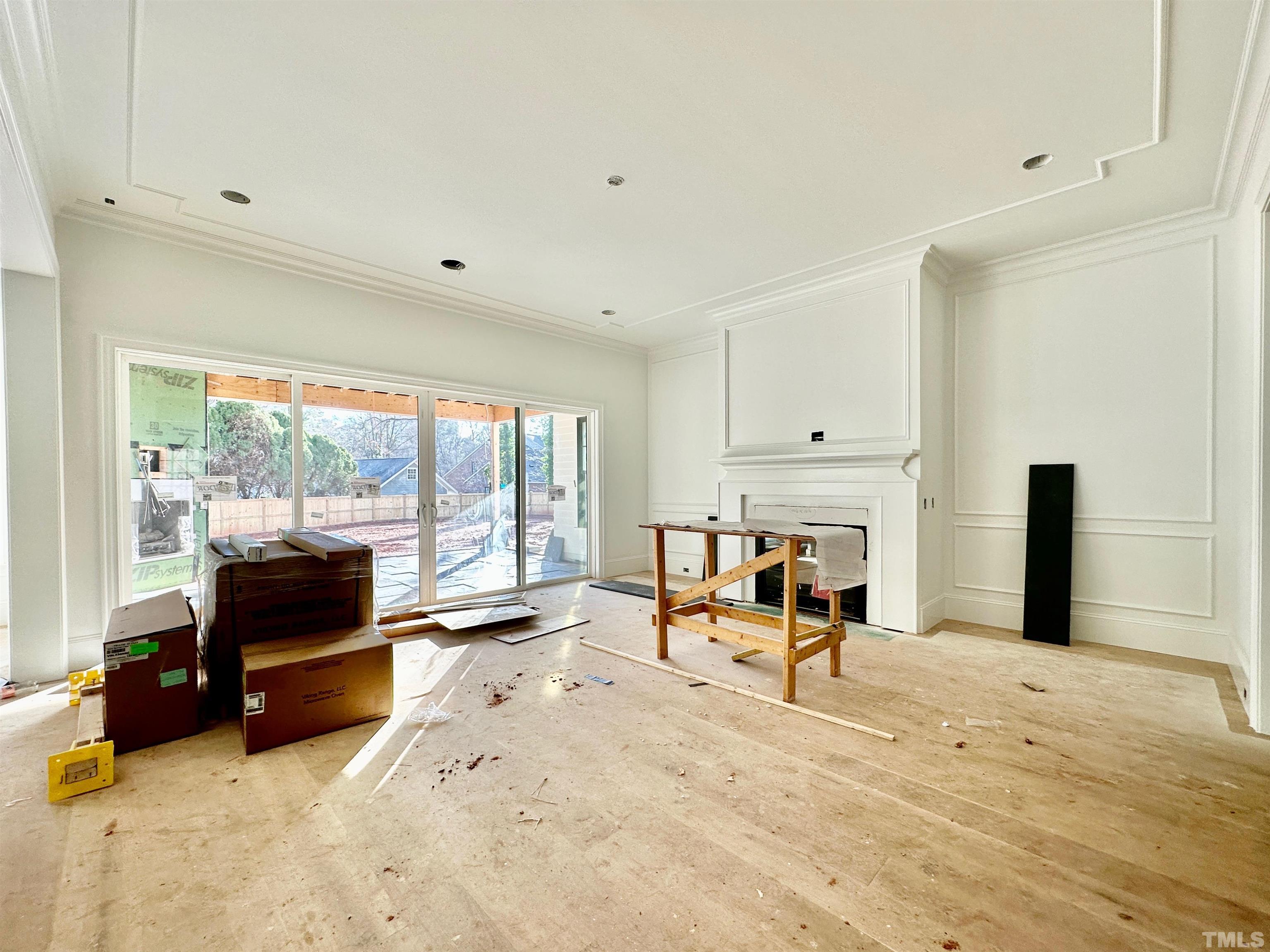 412 Ortega Road Raleigh, NC 27609 - Photo 20 of 53 a living room with furniture and a large window