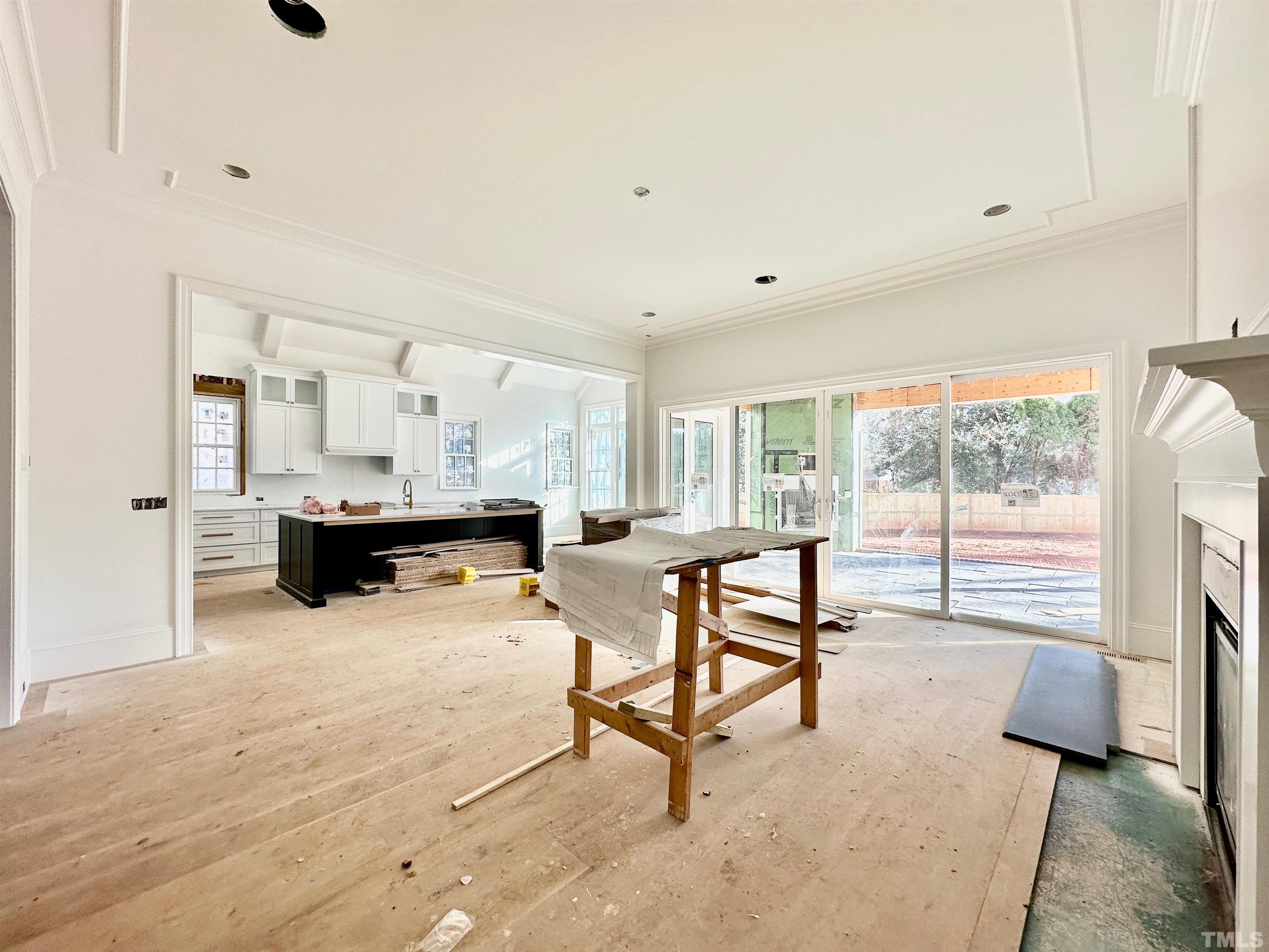412 Ortega Road Raleigh, NC 27609 - Photo 24 of 53 a living room with furniture and a large window