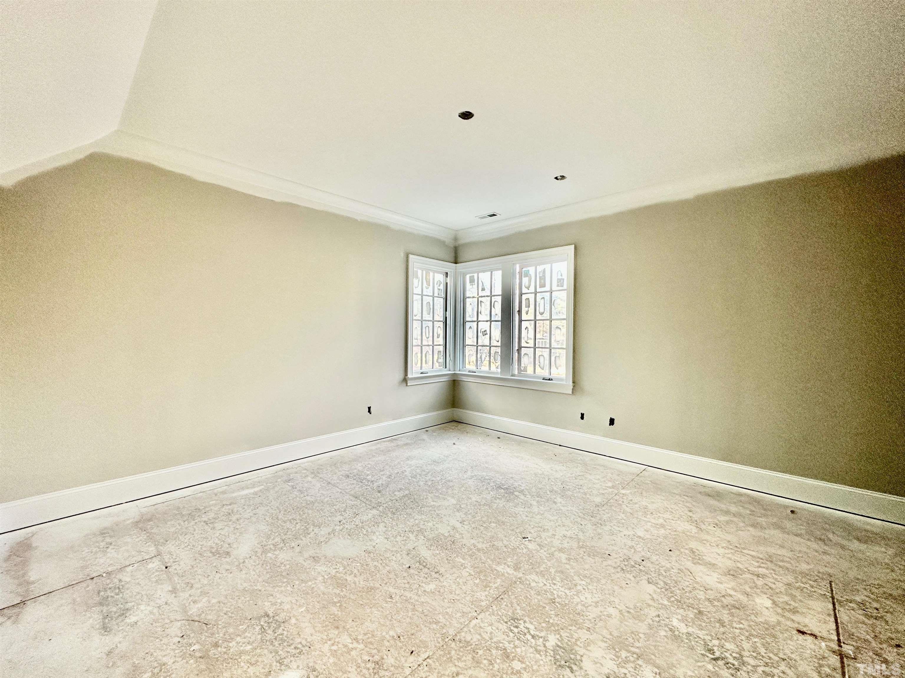 412 Ortega Road Raleigh, NC 27609 - Photo 42 of 53 a view of an empty room with a window