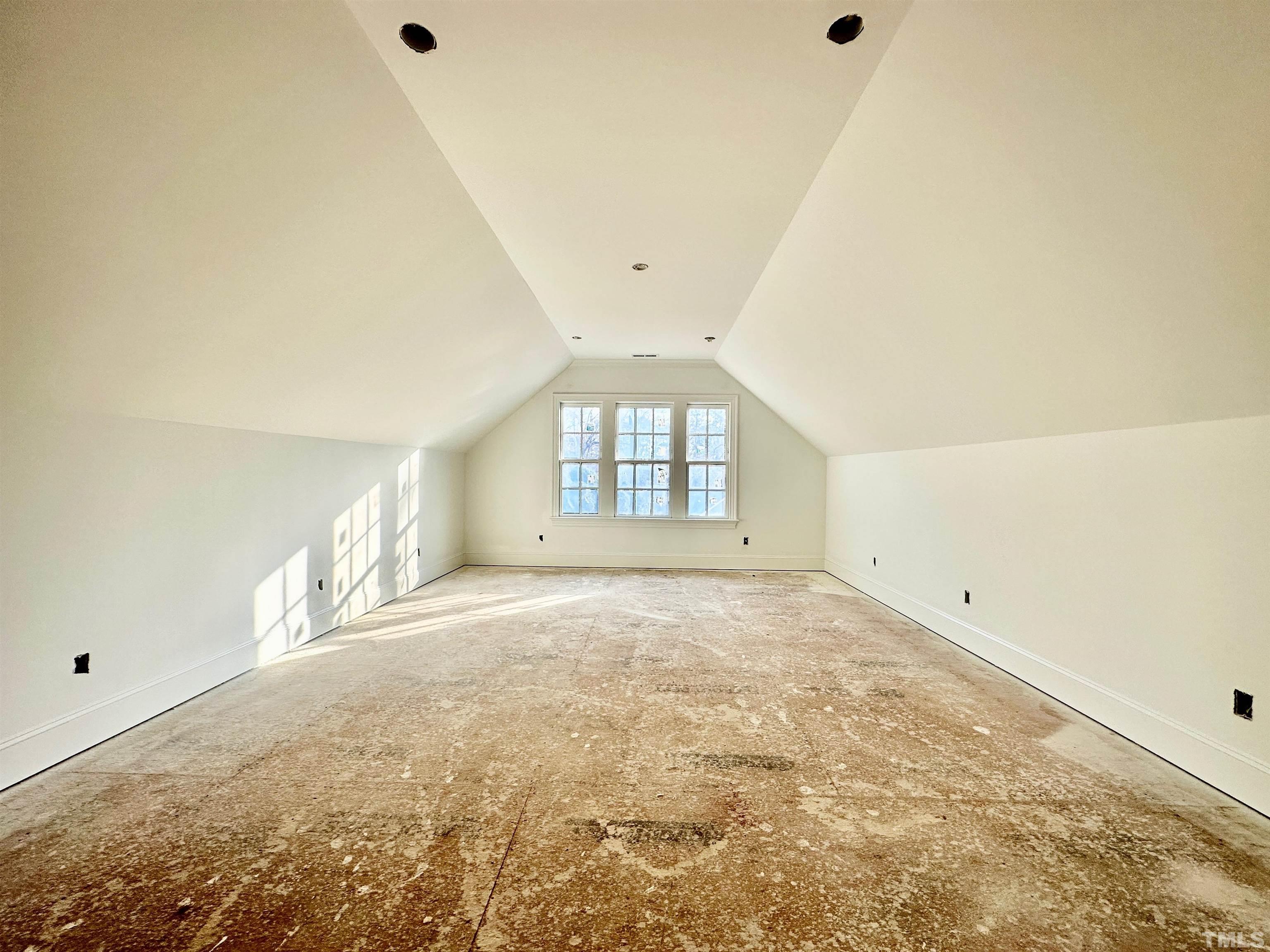 412 Ortega Road Raleigh, NC 27609 - Photo 47 of 53 an empty room with windows