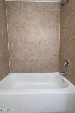 a bathroom with a bathtub