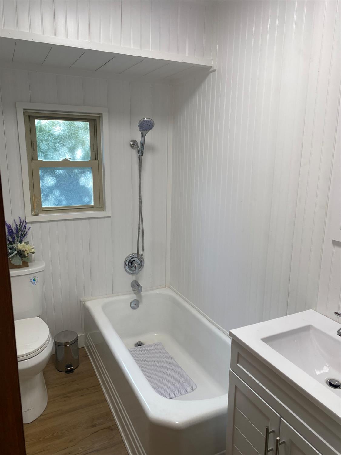 947 West Friesen Avenue Reedley, CA 93654 - Photo 18 of 34 a bathroom with a sink and a toilet