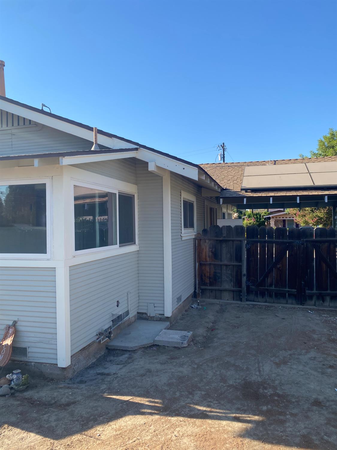 947 West Friesen Avenue Reedley, CA 93654 - Photo 34 of 34 a front view of house with yard