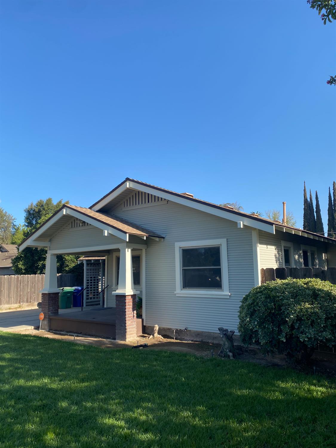 947 West Friesen Avenue Reedley, CA 93654 - Photo 5 of 34 a front view of a house with a garden
