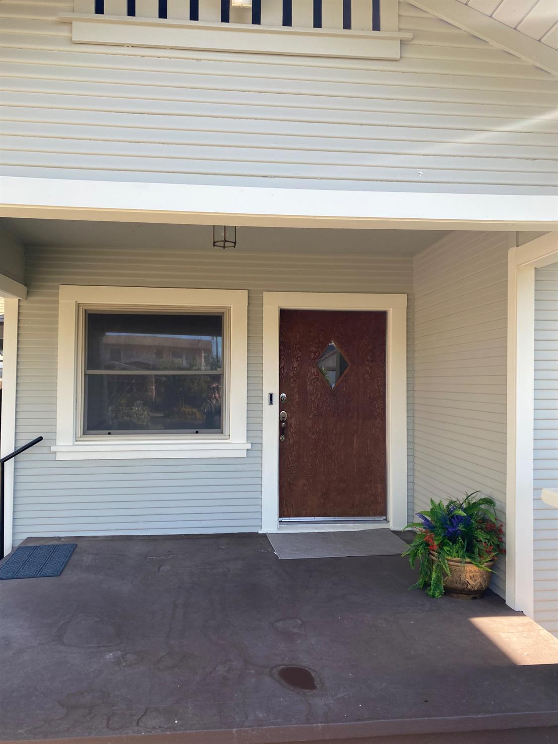947 West Friesen Avenue Reedley, CA 93654 - Photo 6 of 34 a view of front door of house
