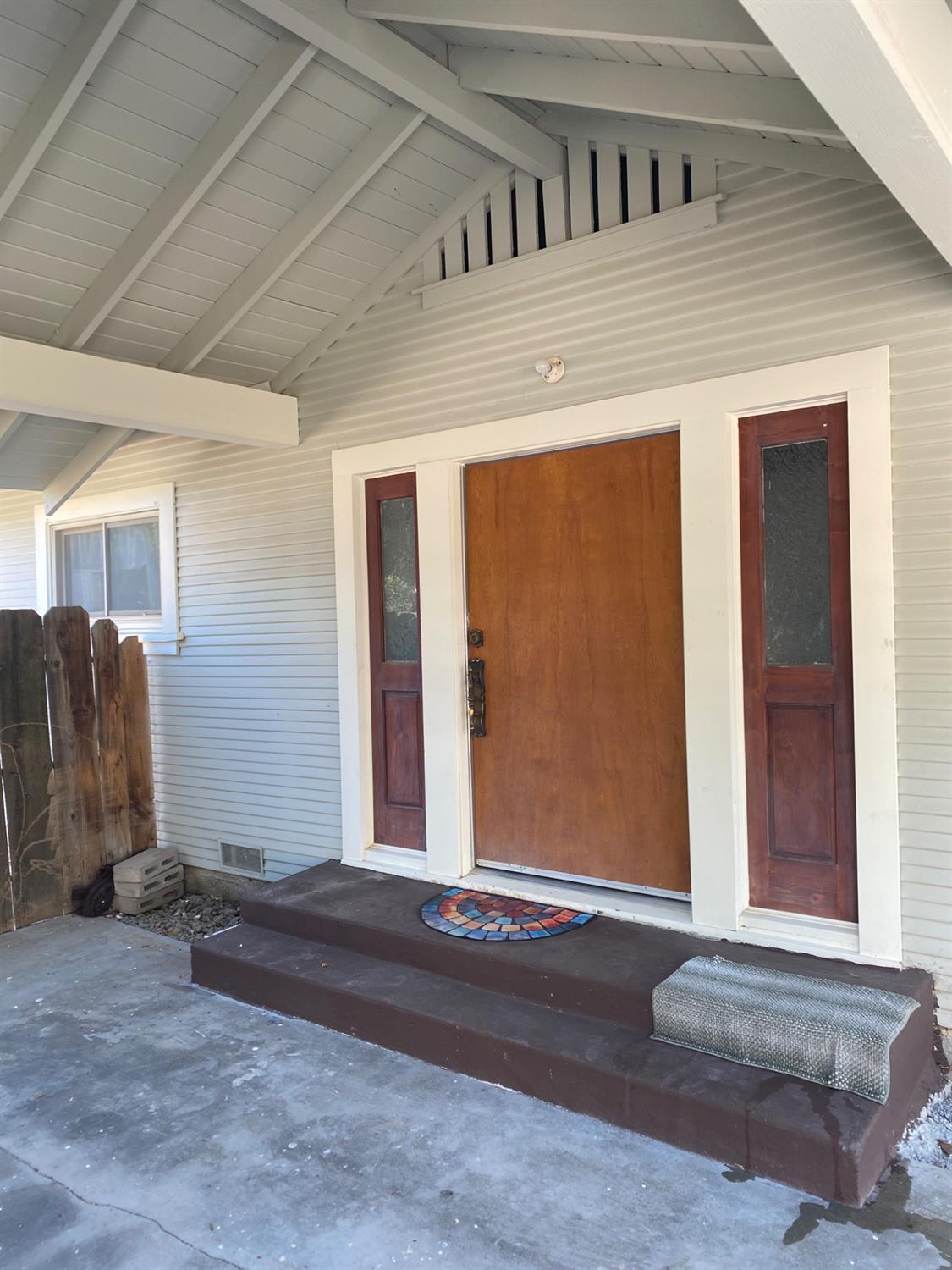 947 West Friesen Avenue Reedley, CA 93654 - Photo 9 of 34 a view of front door of house