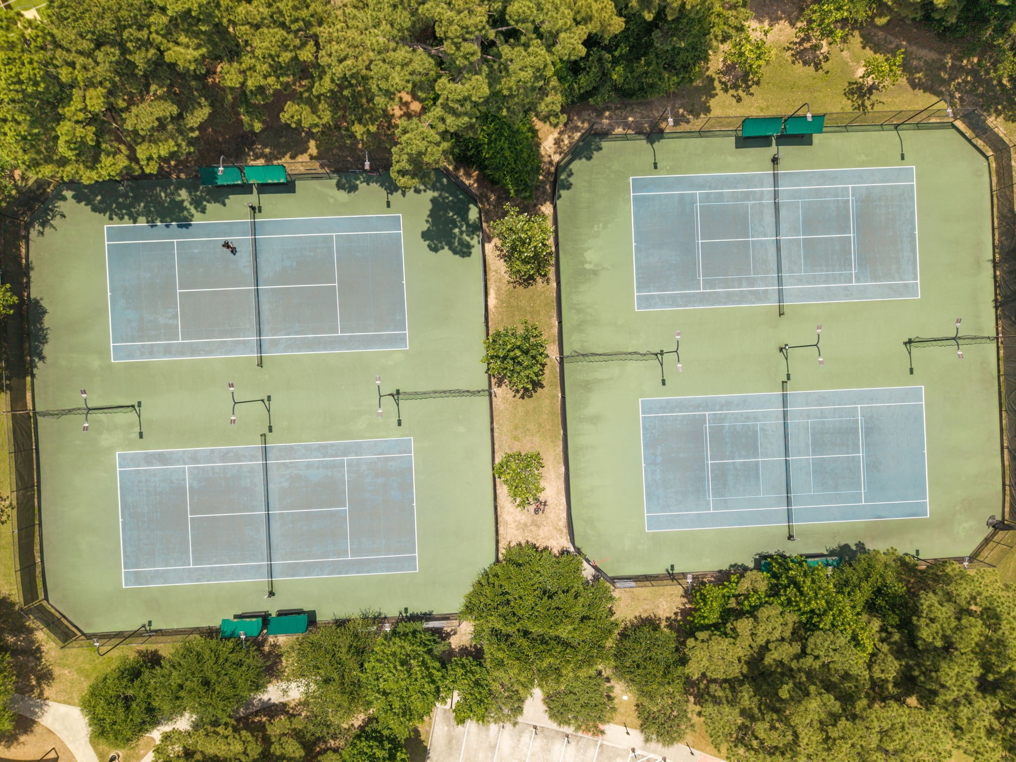 14718 Ramblebrook Humble, TX 77396 - Photo 33 of 38 Resident-access tennis courts support an active community with options for junior and adult play.