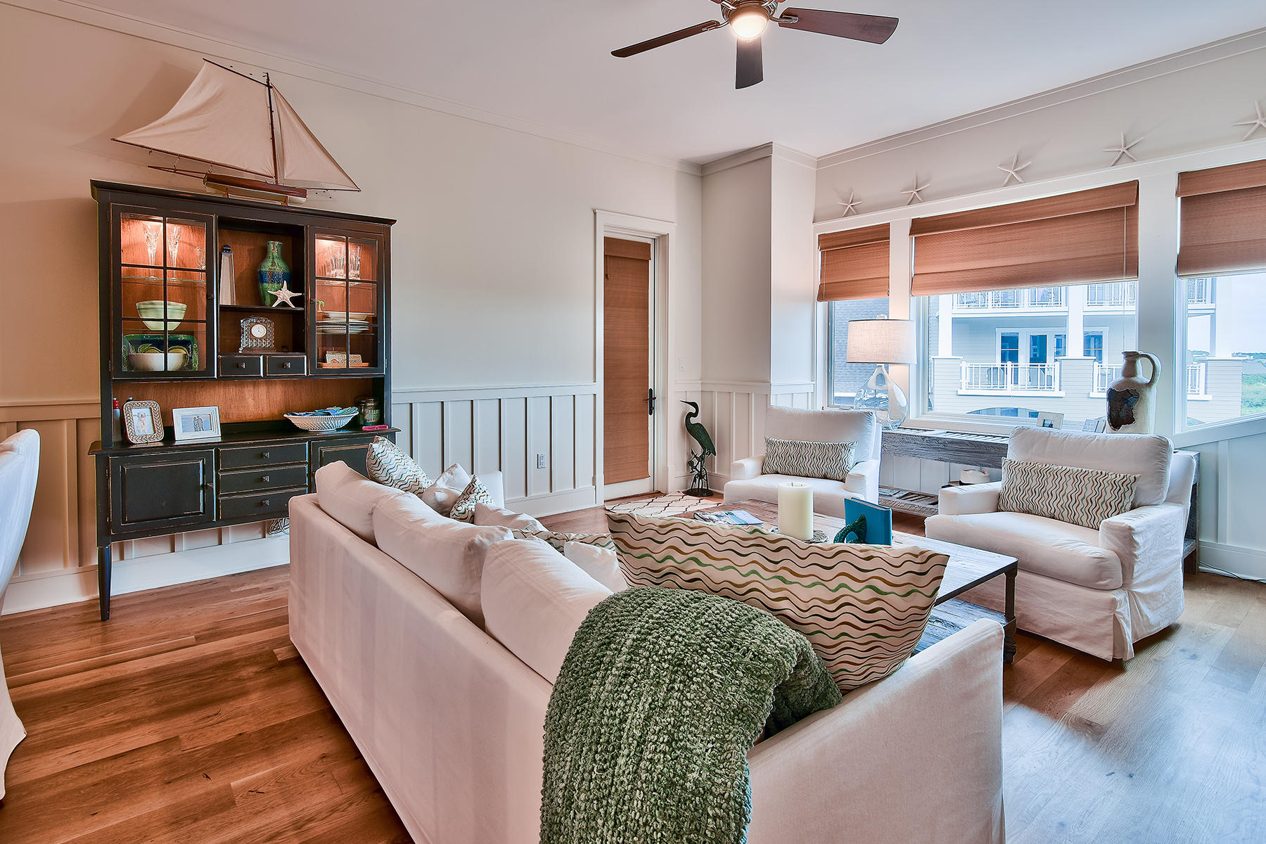 99 Compass Point Way, Unit 303 Watersound, FL 32461 - Photo 7 of 24 a bedroom with furniture and a large window