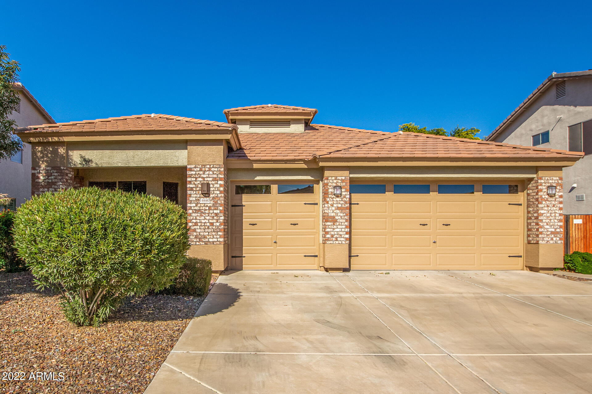 14440 West Redfield Road Surprise, AZ 85379 - Photo 2 of 36 a front view of a house