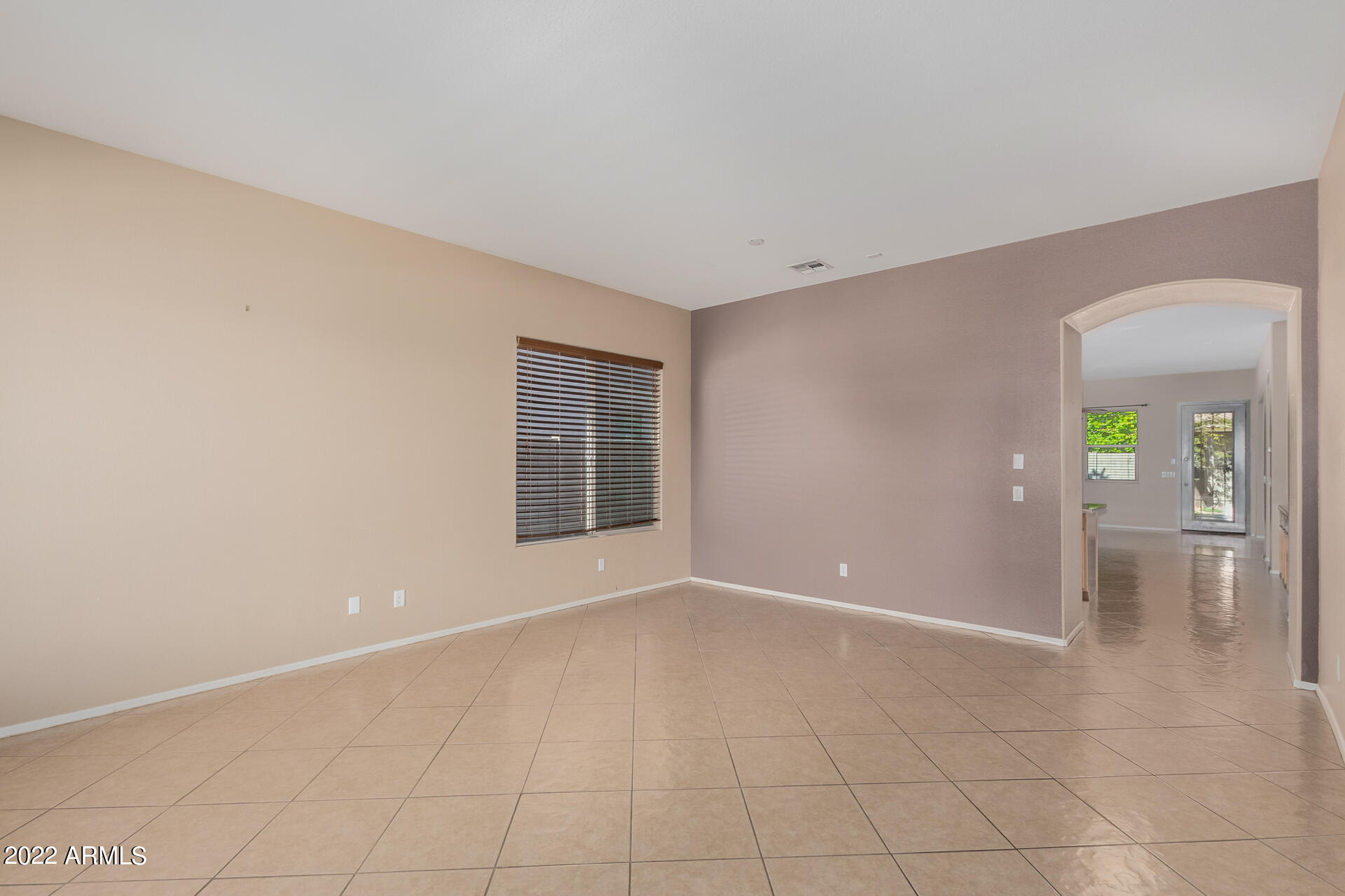 14440 West Redfield Road Surprise, AZ 85379 - Photo 21 of 36 a view of an empty room with a window