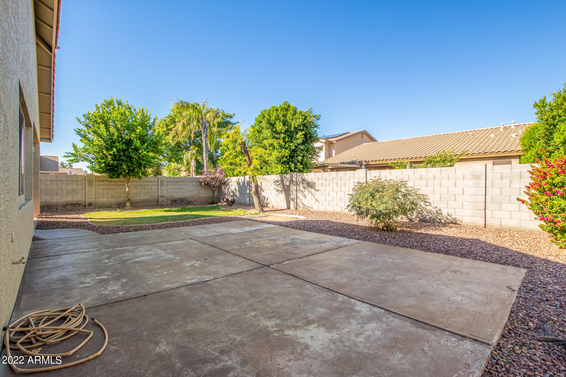 14440 West Redfield Road Surprise, AZ 85379 - Photo 30 of 36 a view of a yard with potted plants