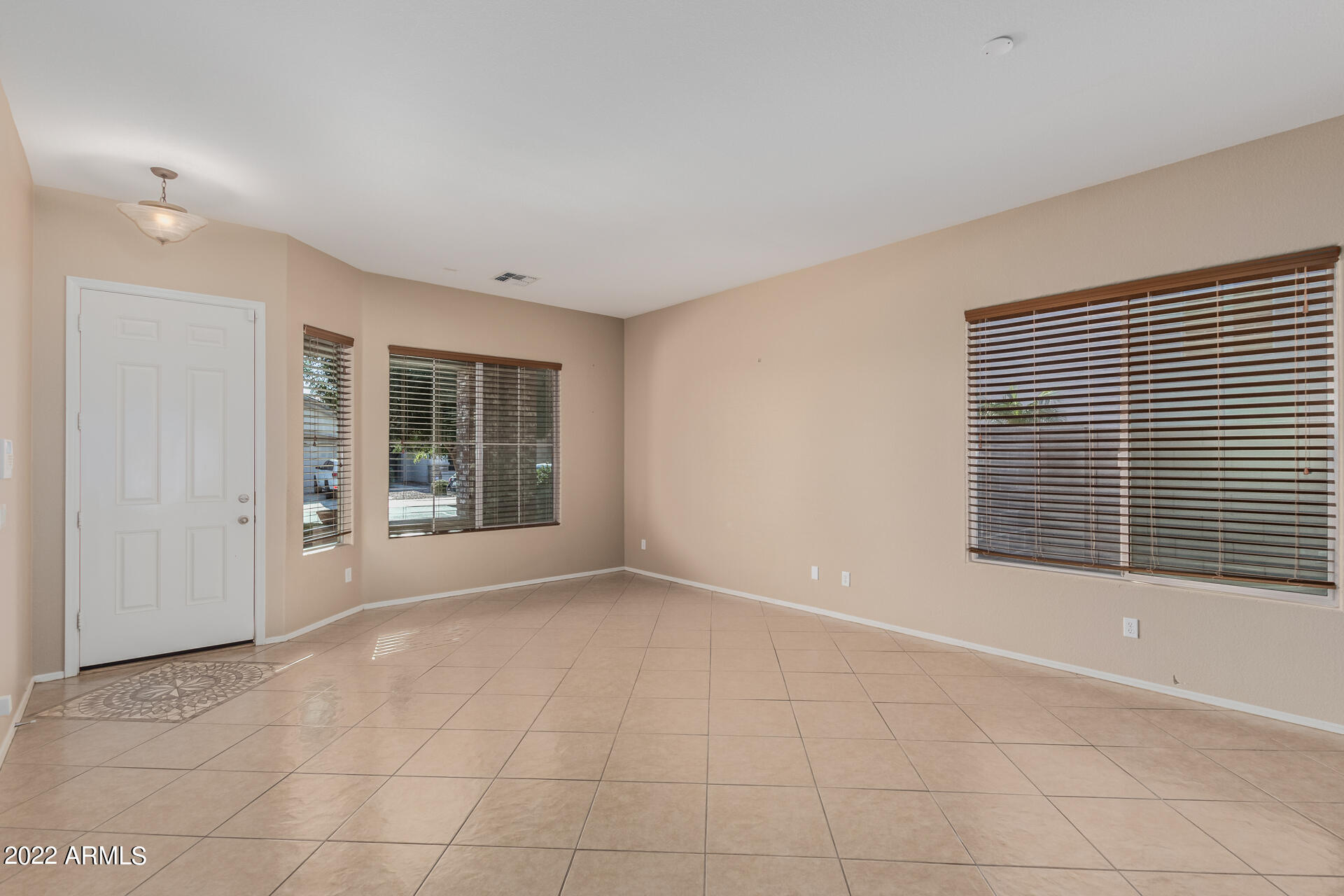 14440 West Redfield Road Surprise, AZ 85379 - Photo 35 of 36 a view of an empty room with a window