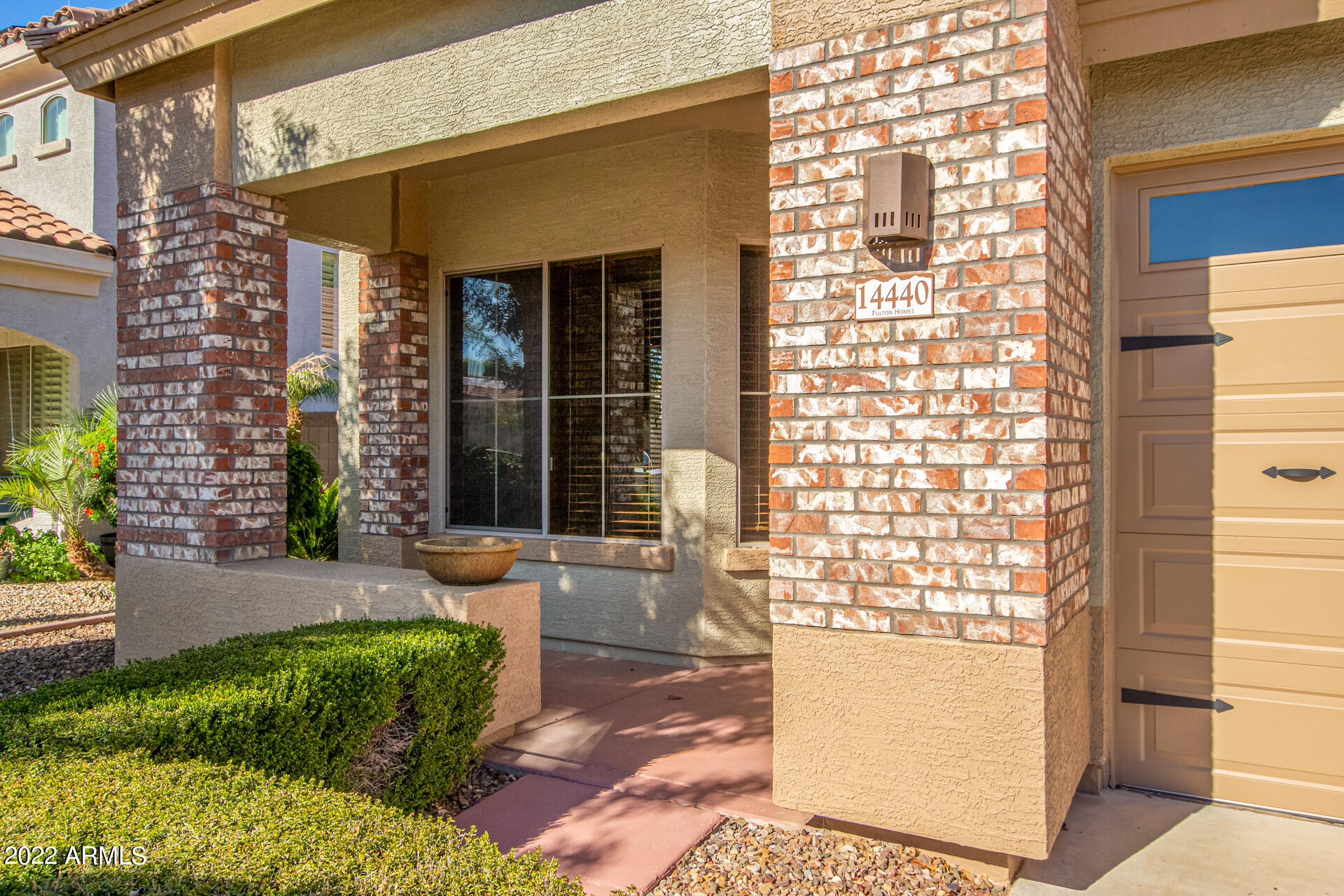 14440 West Redfield Road Surprise, AZ 85379 - Photo 4 of 36 a front view of a house with a yard