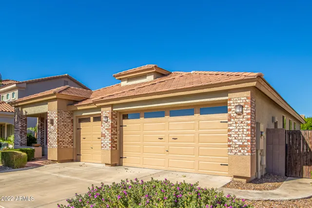 a view of a house with a garage