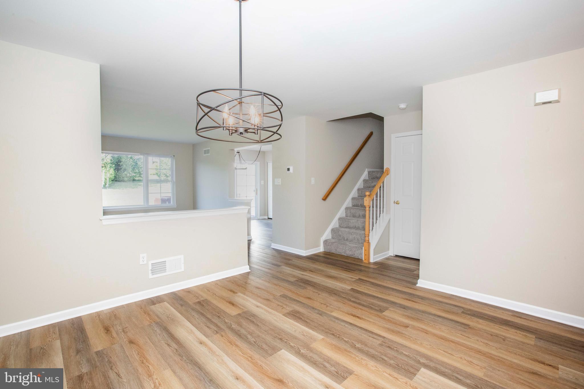20 White Pine Gulch Reading, PA 19607 - Photo 7 of 28 Dining area opens into living area
