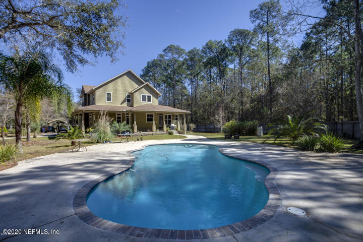 2349 Marlee Road South St. Johns, FL 32259 - Photo 3 of 3 a front view of a house with a yard