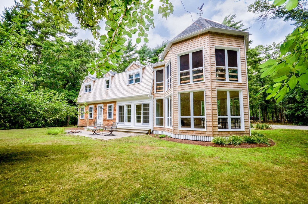 544 Point Road Marion, MA 02738 - Photo 1 of 25 a front view of a house with a yard
