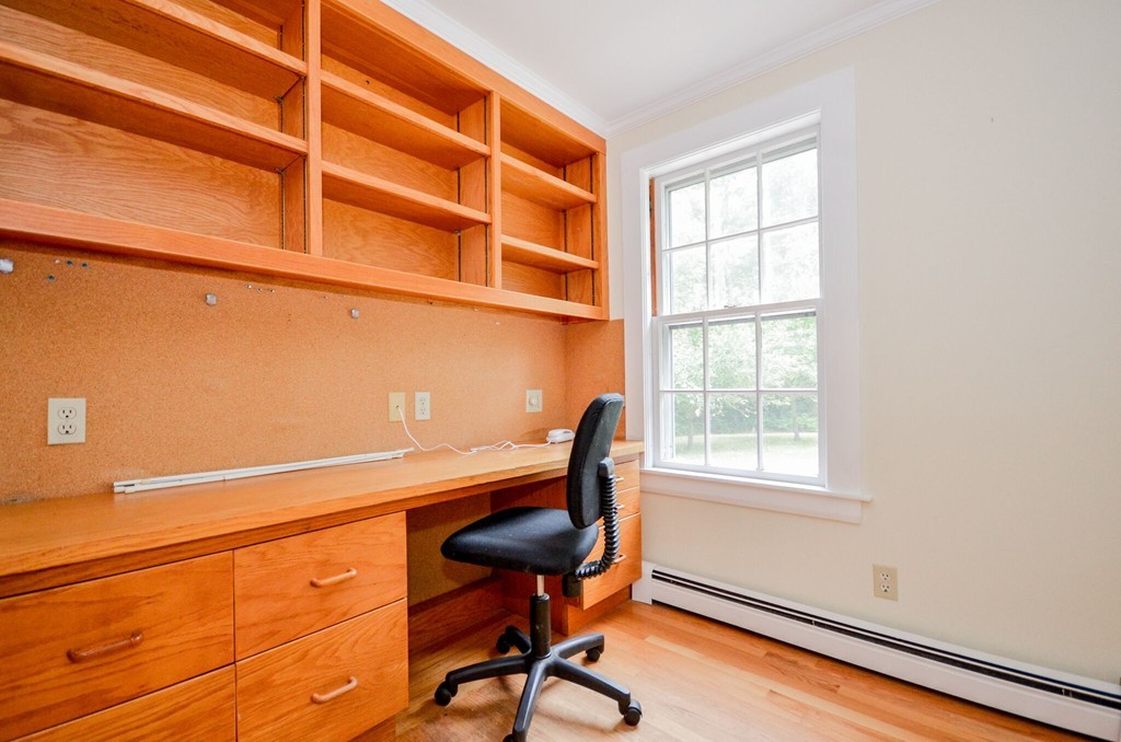 544 Point Road Marion, MA 02738 - Photo 11 of 25 a view of a workspace with furniture and a window