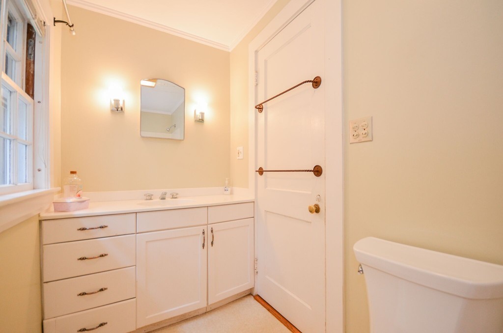 544 Point Road Marion, MA 02738 - Photo 20 of 25 a bathroom with a sink a toilet and a mirror
