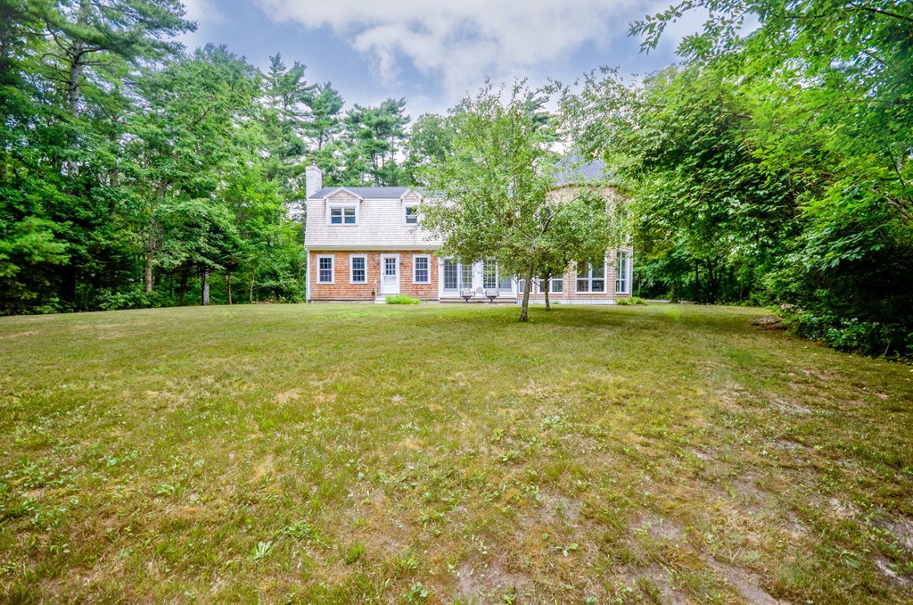 544 Point Road Marion, MA 02738 - Photo 4 of 25 a view of a large garden with plants and large trees