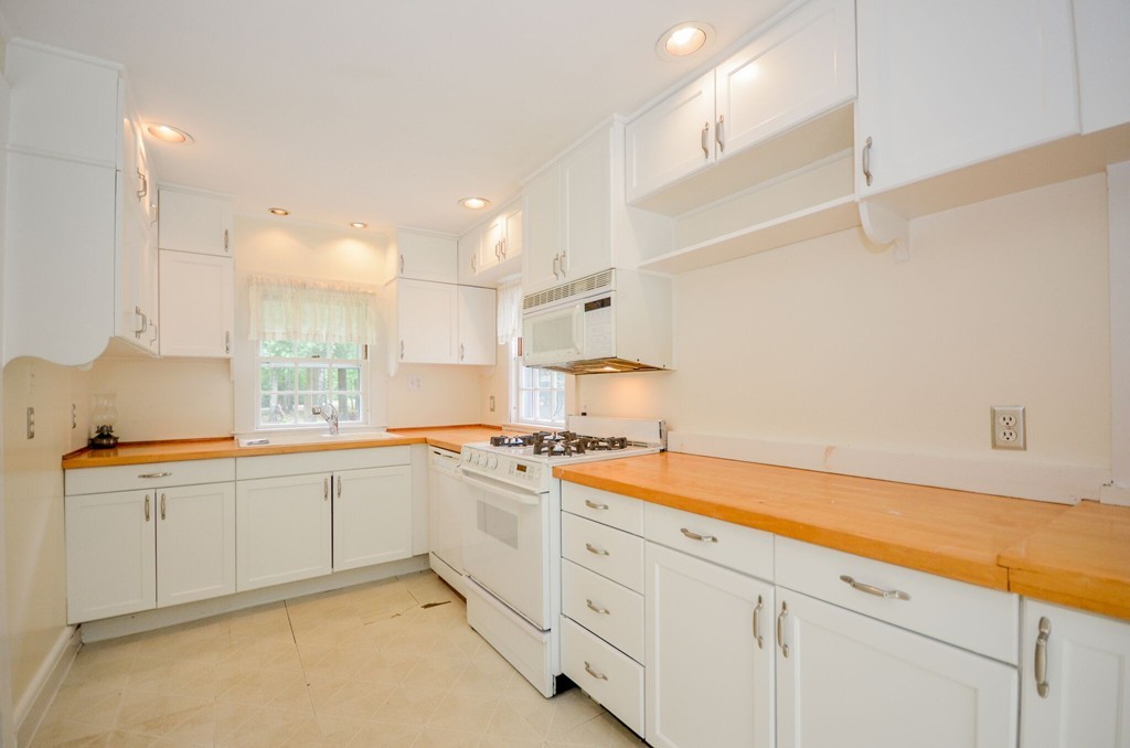 544 Point Road Marion, MA 02738 - Photo 6 of 25 a kitchen with a sink and cabinets