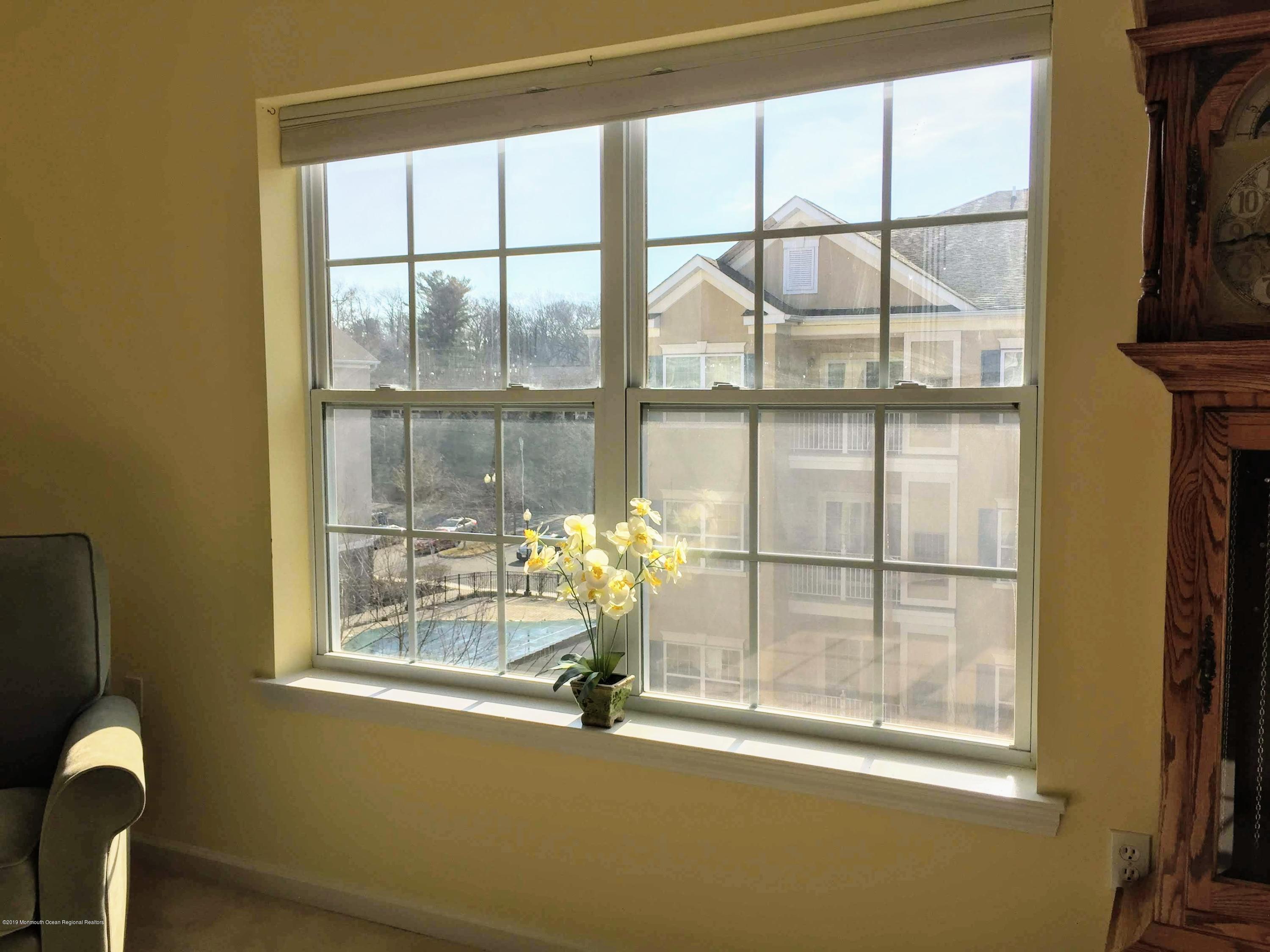 540 Cranbury Road, Unit 419 East Brunswick, NJ 08816 - Photo 12 of 42 a room with a large window