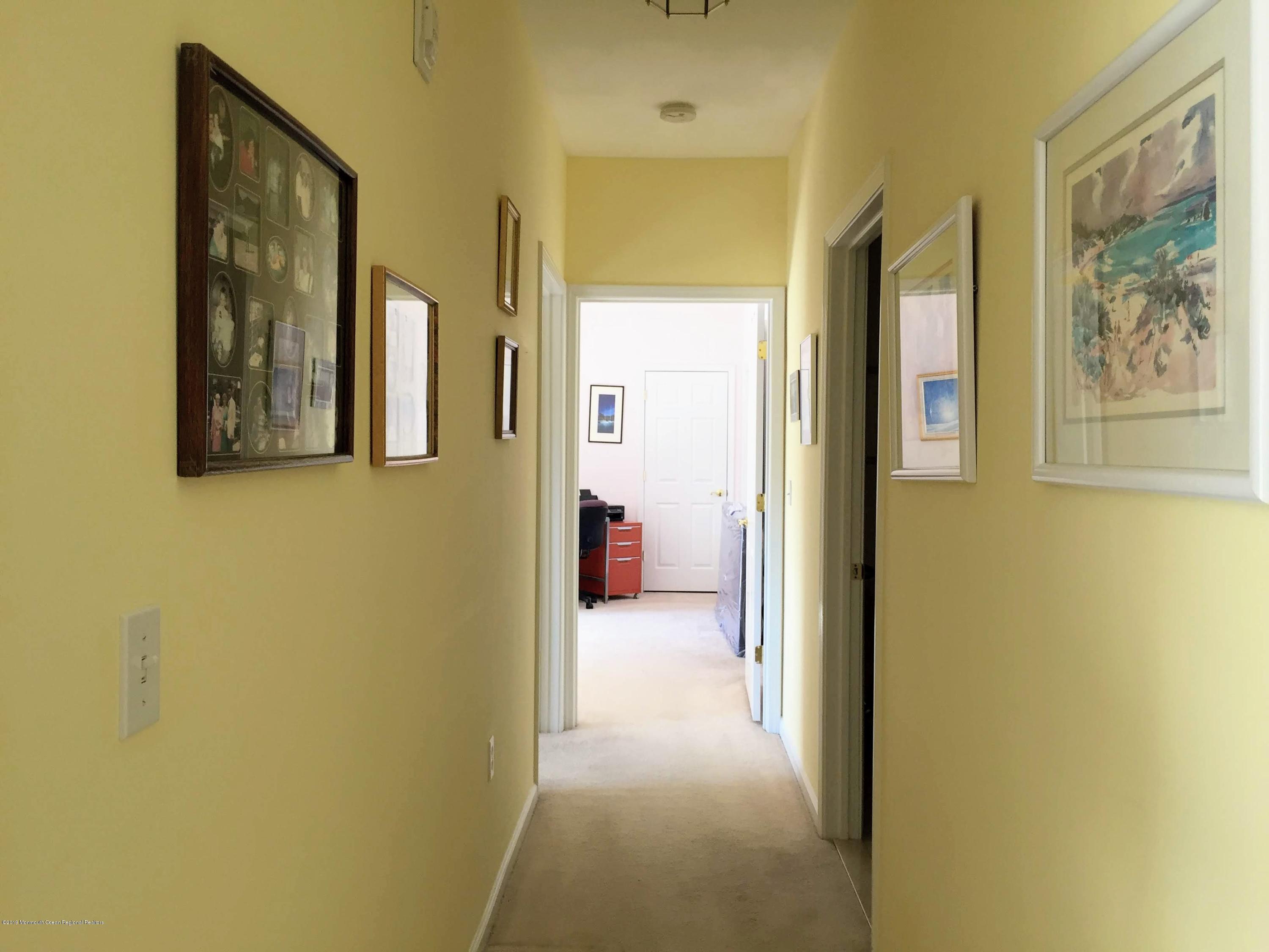 540 Cranbury Road, Unit 419 East Brunswick, NJ 08816 - Photo 16 of 42 a view of a hallway with a elevator