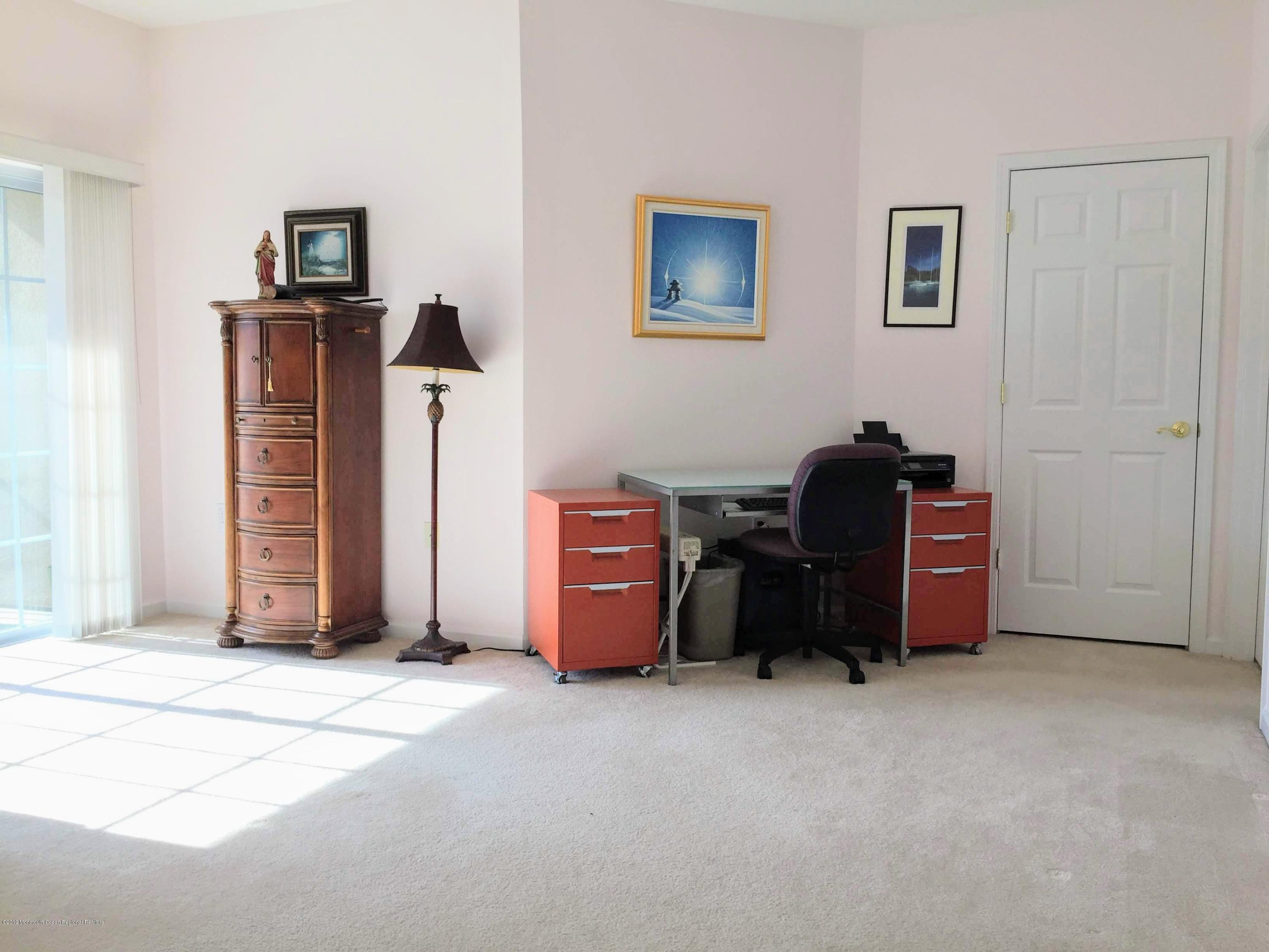 540 Cranbury Road, Unit 419 East Brunswick, NJ 08816 - Photo 18 of 42 a view of a workspace with furniture