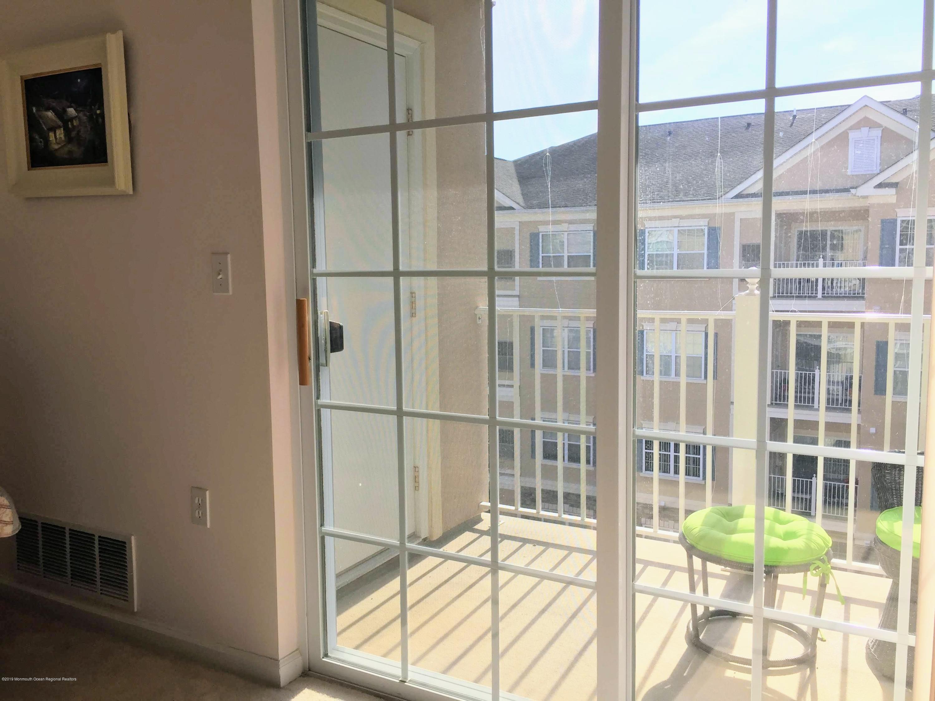 540 Cranbury Road, Unit 419 East Brunswick, NJ 08816 - Photo 19 of 42 a view of a balcony