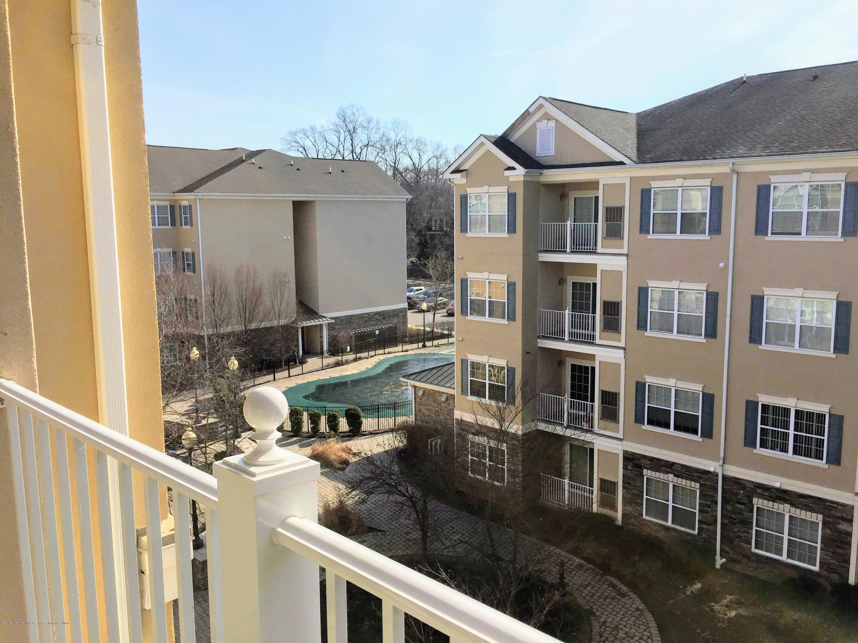 540 Cranbury Road, Unit 419 East Brunswick, NJ 08816 - Photo 20 of 42 a house view with a garden space