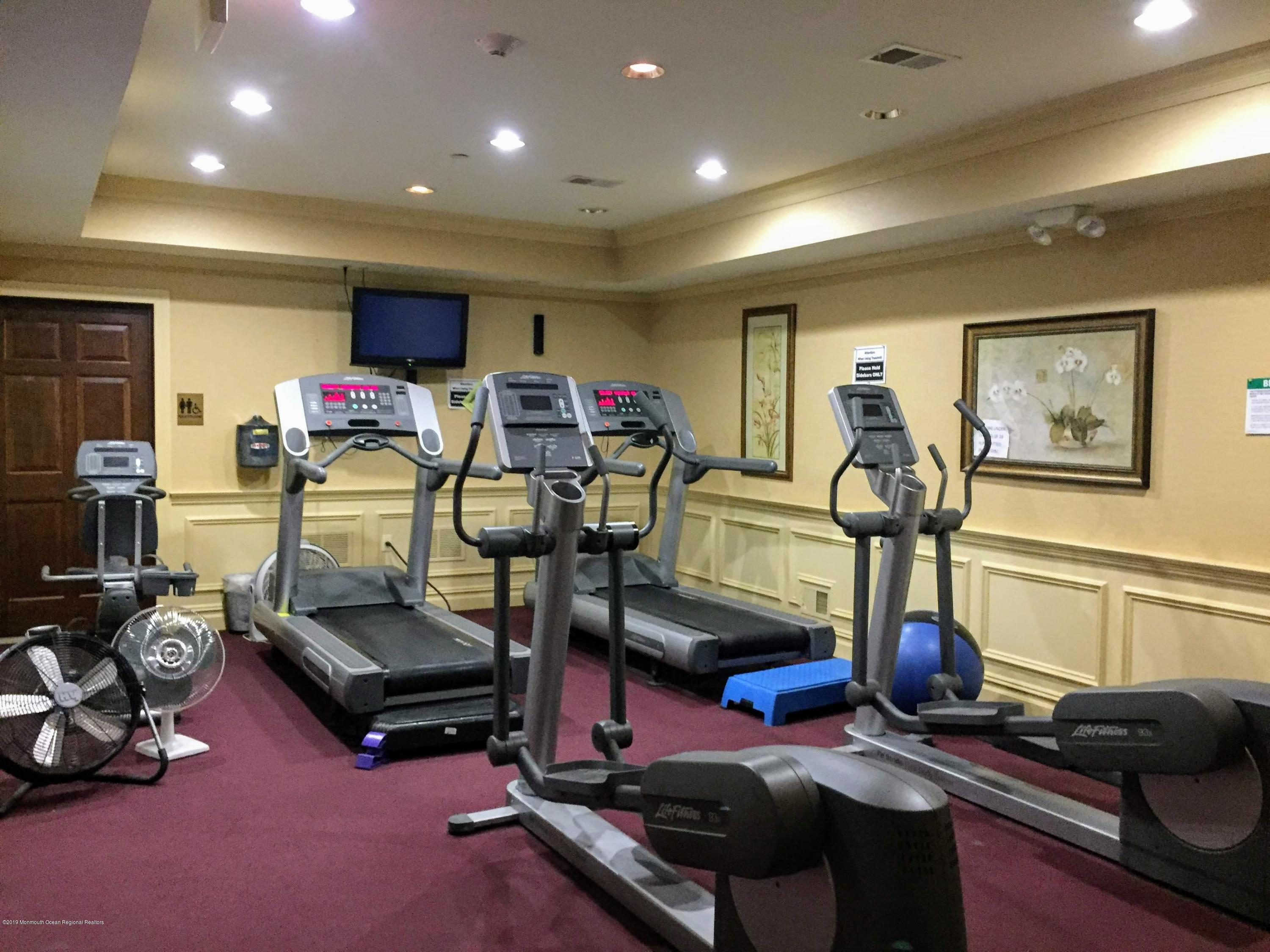 540 Cranbury Road, Unit 419 East Brunswick, NJ 08816 - Photo 31 of 42 a view of a room with gym equipment