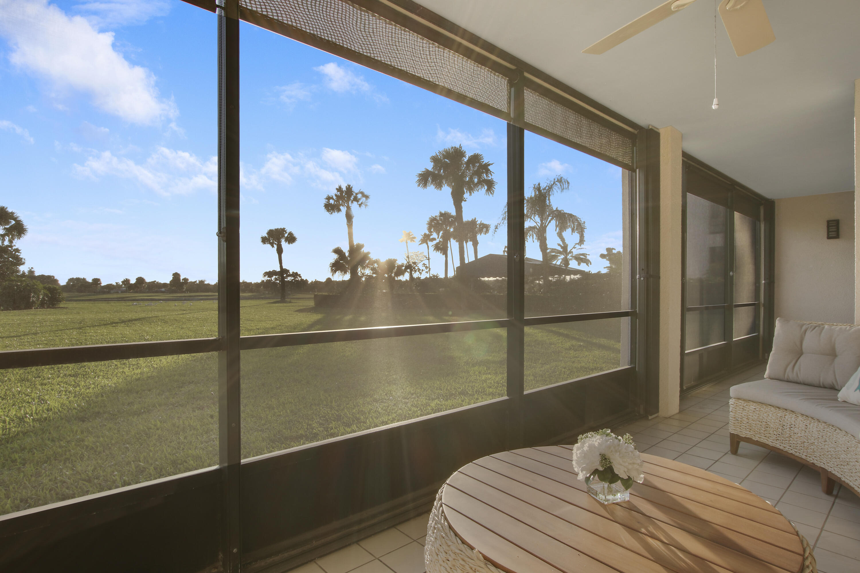 356 Golfview Road, Unit 101 North Palm Beach, FL 33408 - Photo 5 of 25 Screened-in patio