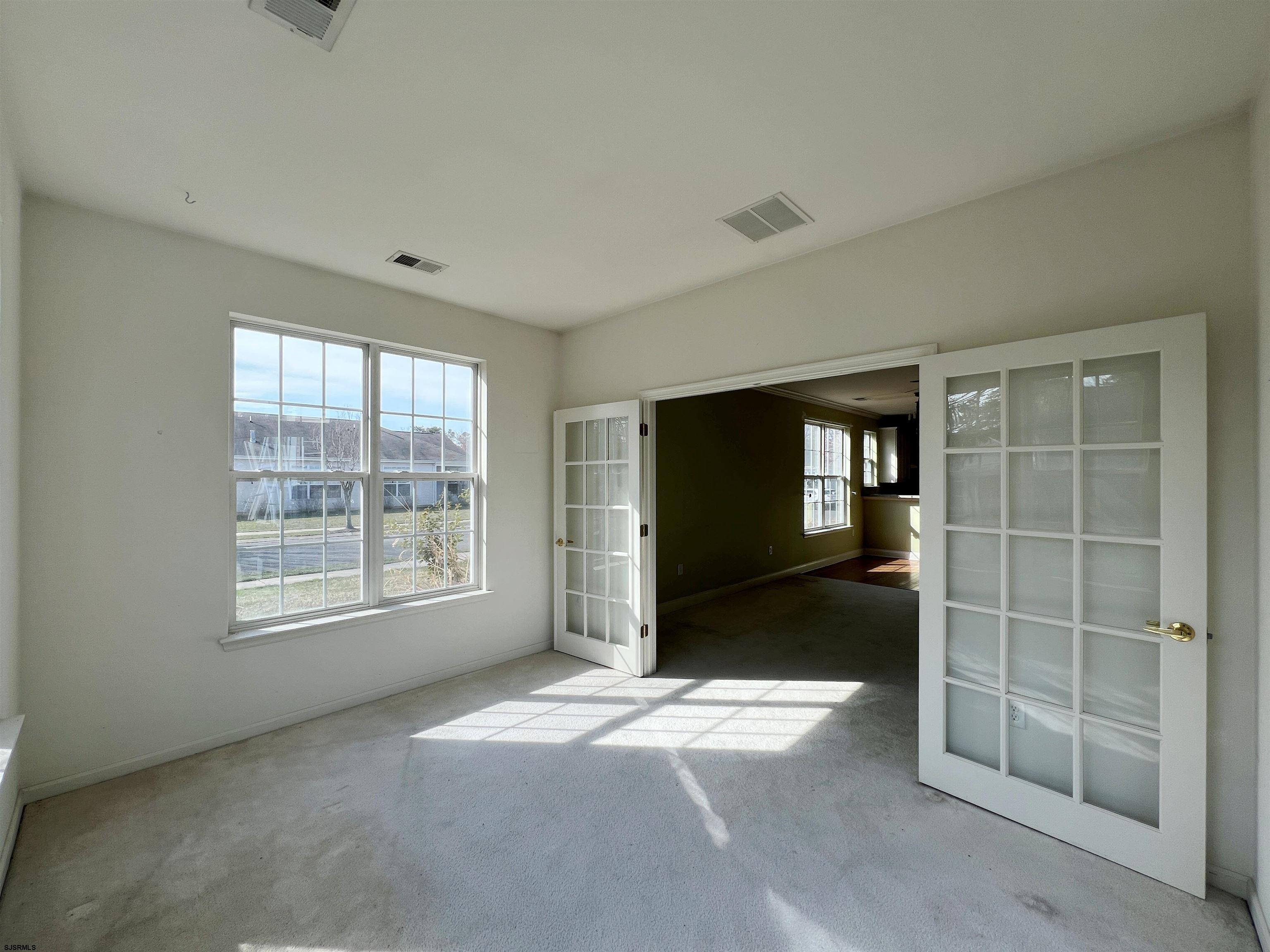 8 Manchester Street Galloway Township, NJ 08205 - Photo 14 of 31 an empty room with windows