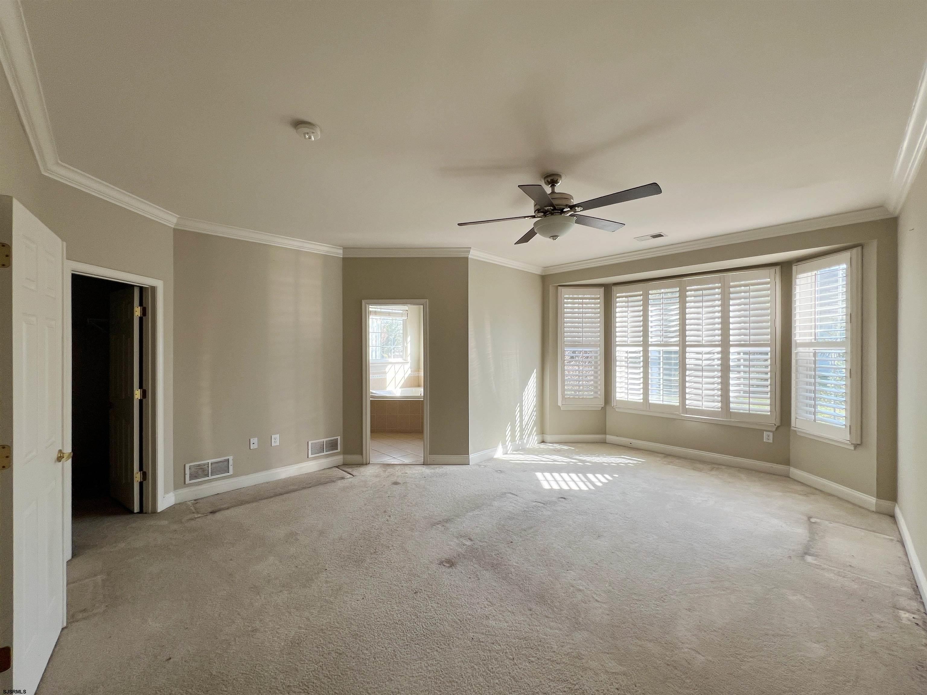 8 Manchester Street Galloway Township, NJ 08205 - Photo 17 of 31 a view of an empty room with a window