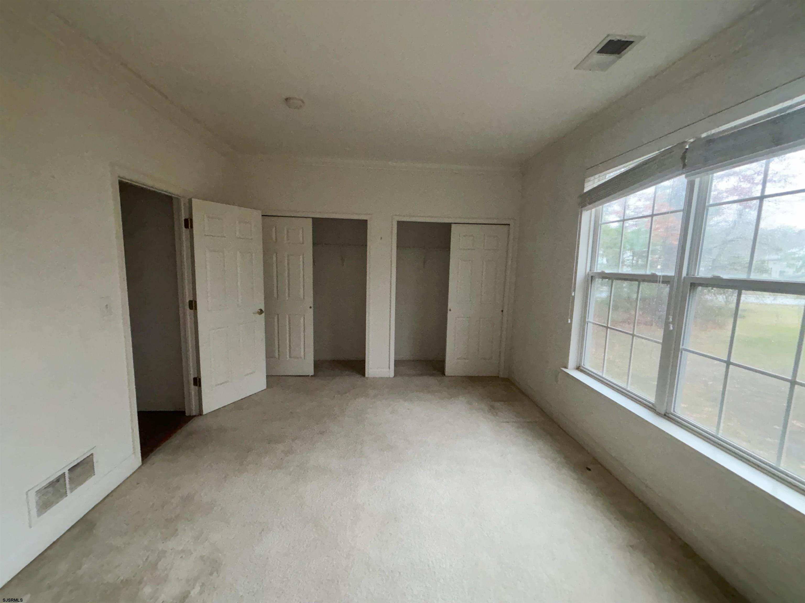 8 Manchester Street Galloway Township, NJ 08205 - Photo 24 of 31 a view of an empty room with a window