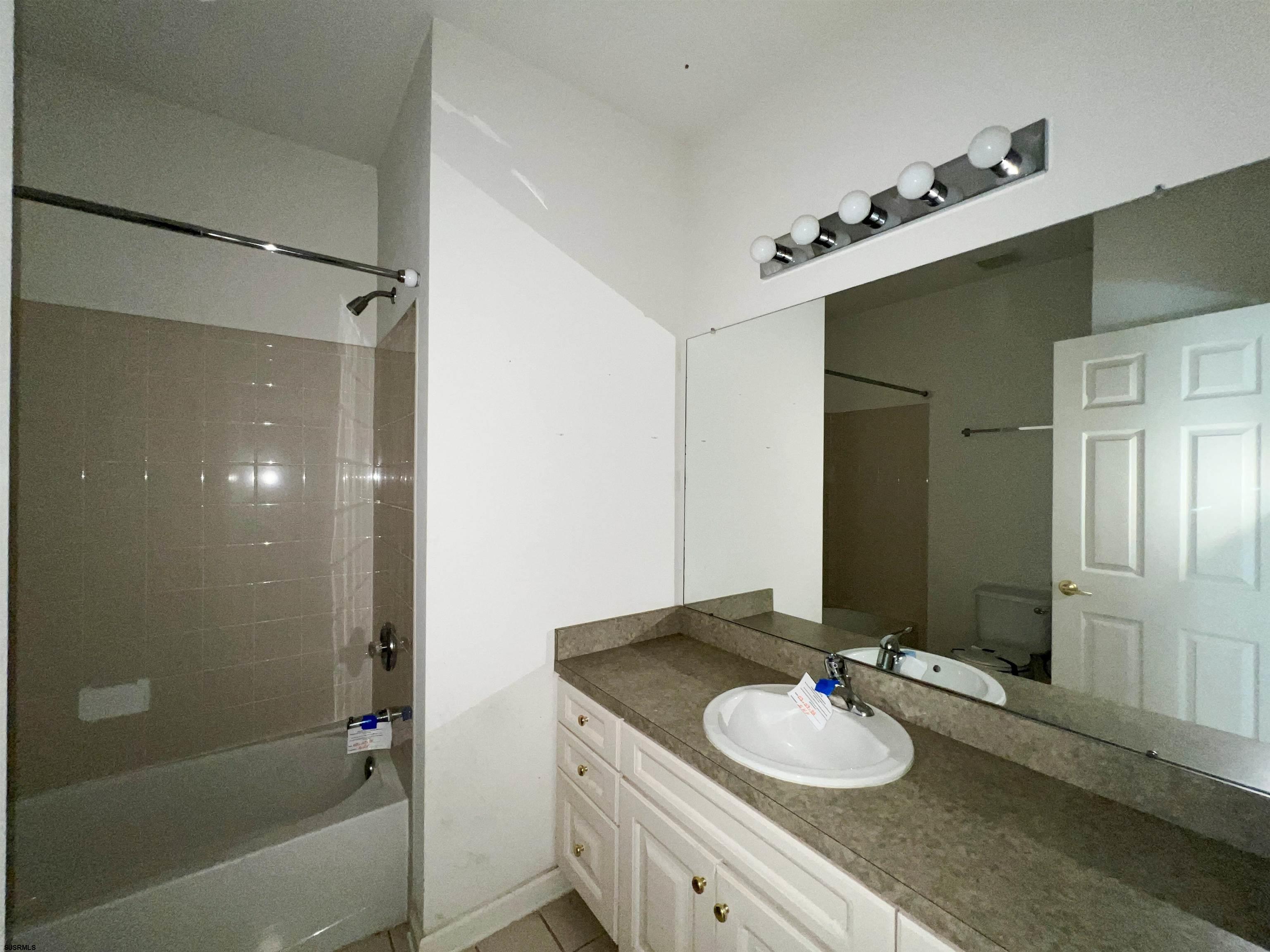 8 Manchester Street Galloway Township, NJ 08205 - Photo 26 of 31 a bathroom with a granite countertop sink mirror and shower