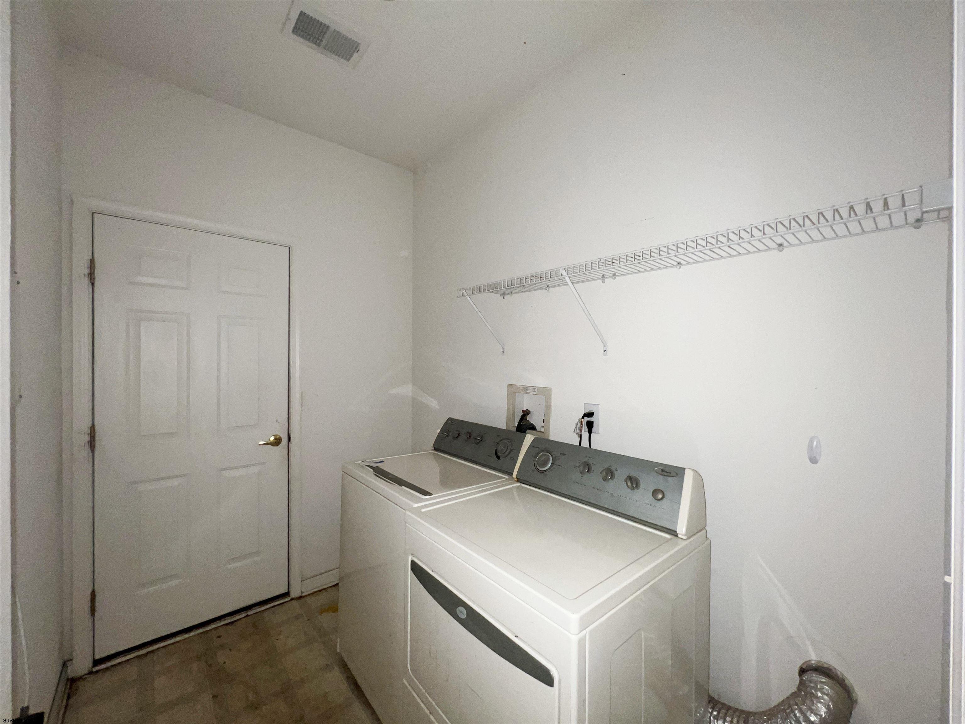 8 Manchester Street Galloway Township, NJ 08205 - Photo 28 of 31 a utility room with dryer and washer