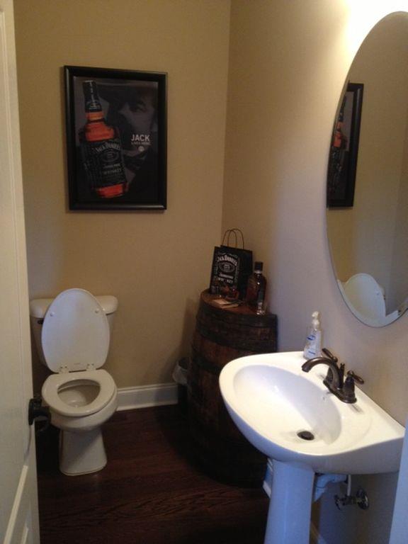 2012 Lincoln Road Spring Hill, TN 37174 - Photo 10 of 25 a bathroom with a toilet sink and mirror