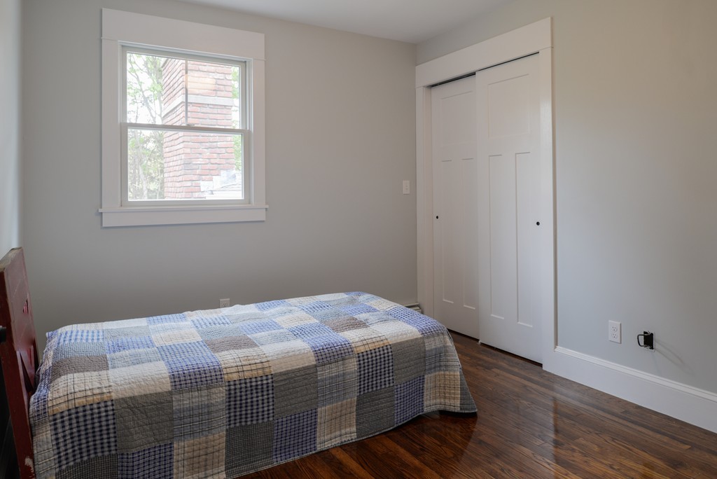 22 Marble Road Gloucester, MA 01930 - Photo 18 of 25 a bedroom with a bed and a window
