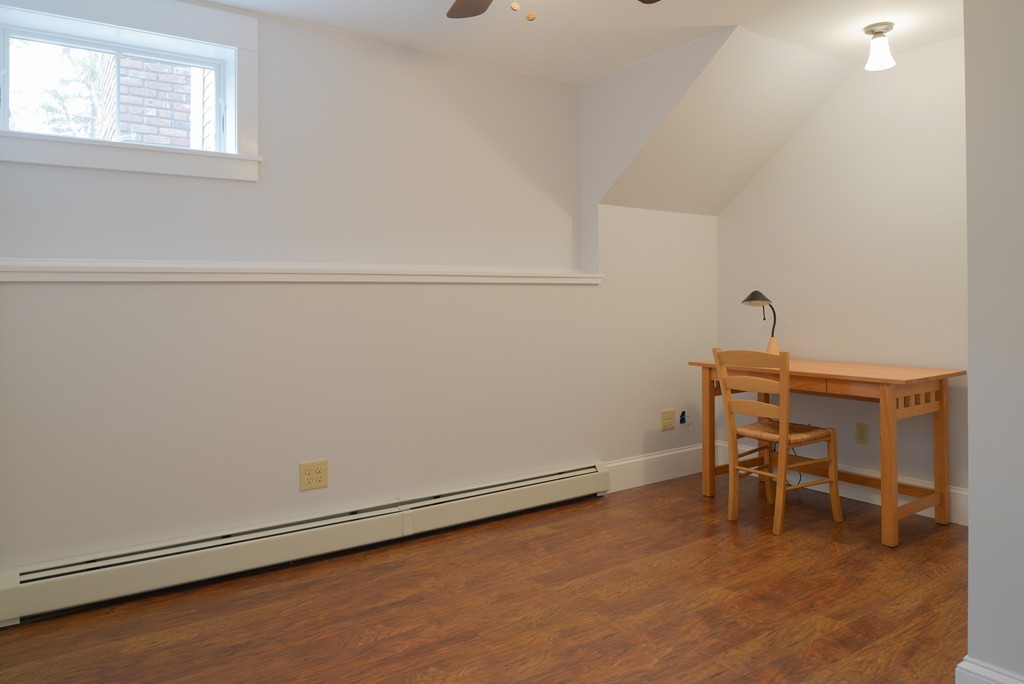 22 Marble Road Gloucester, MA 01930 - Photo 19 of 25 a room with a table and chairs