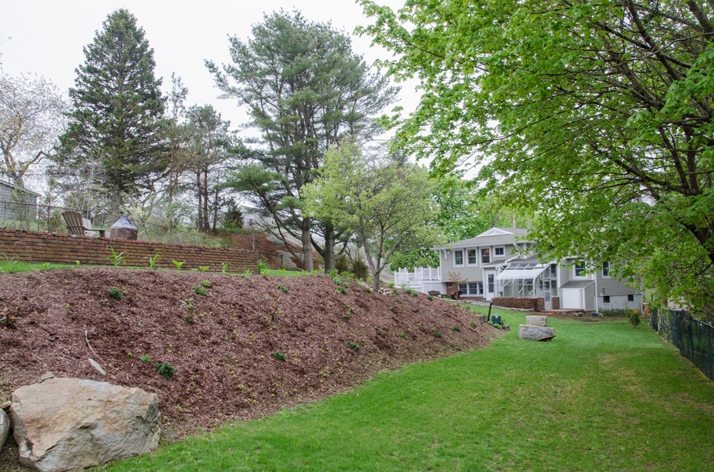 22 Marble Road Gloucester, MA 01930 - Photo 23 of 25 a view of a house with a yard and sitting area